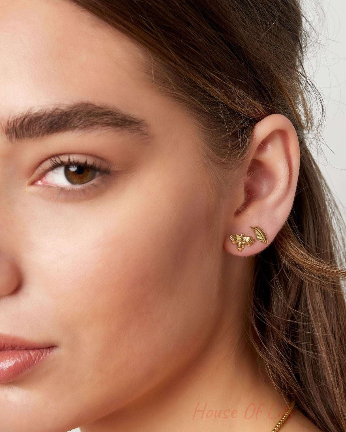 Ear stud feather - Gold Color Stainless Steel