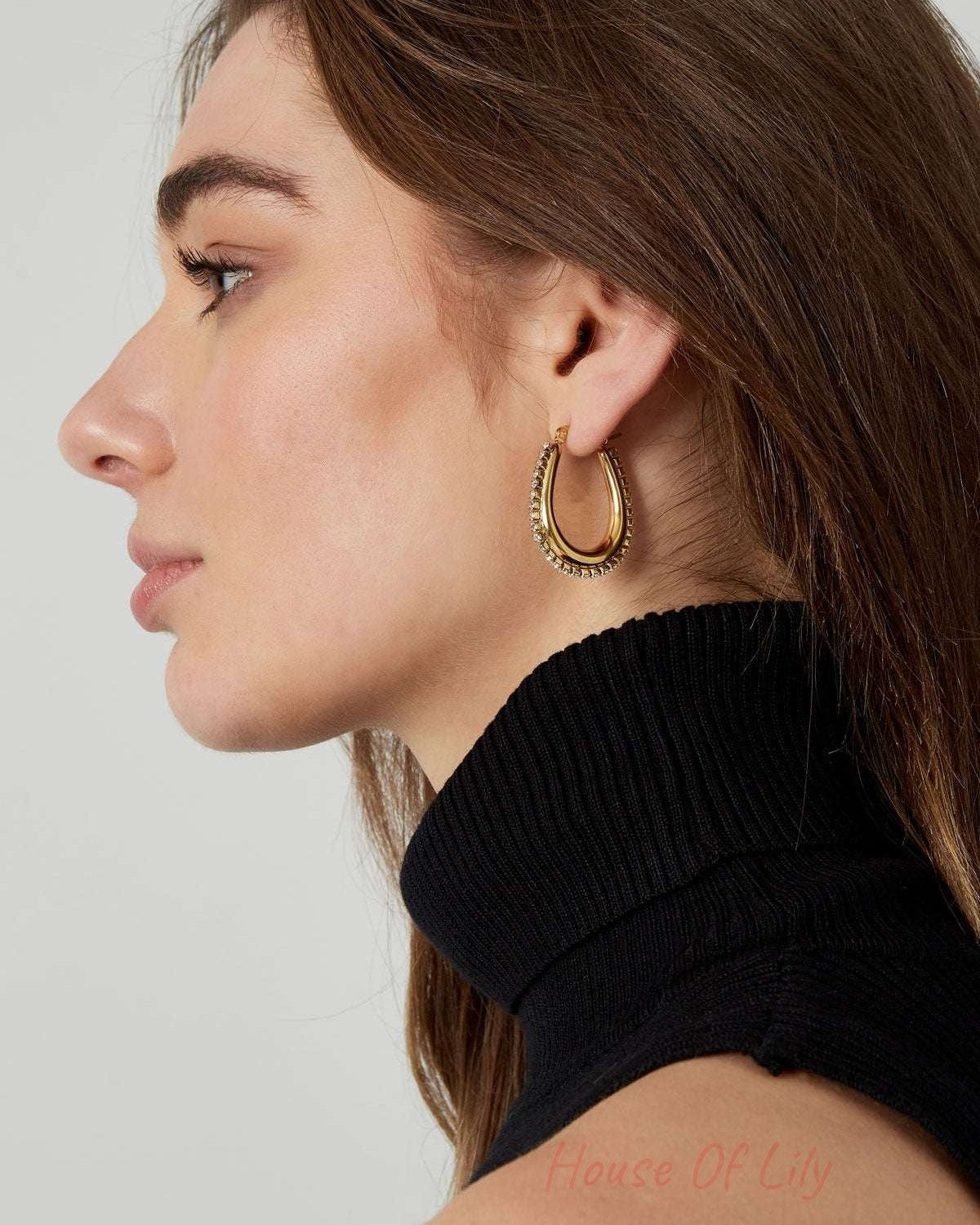 drop shaped earrings with stones