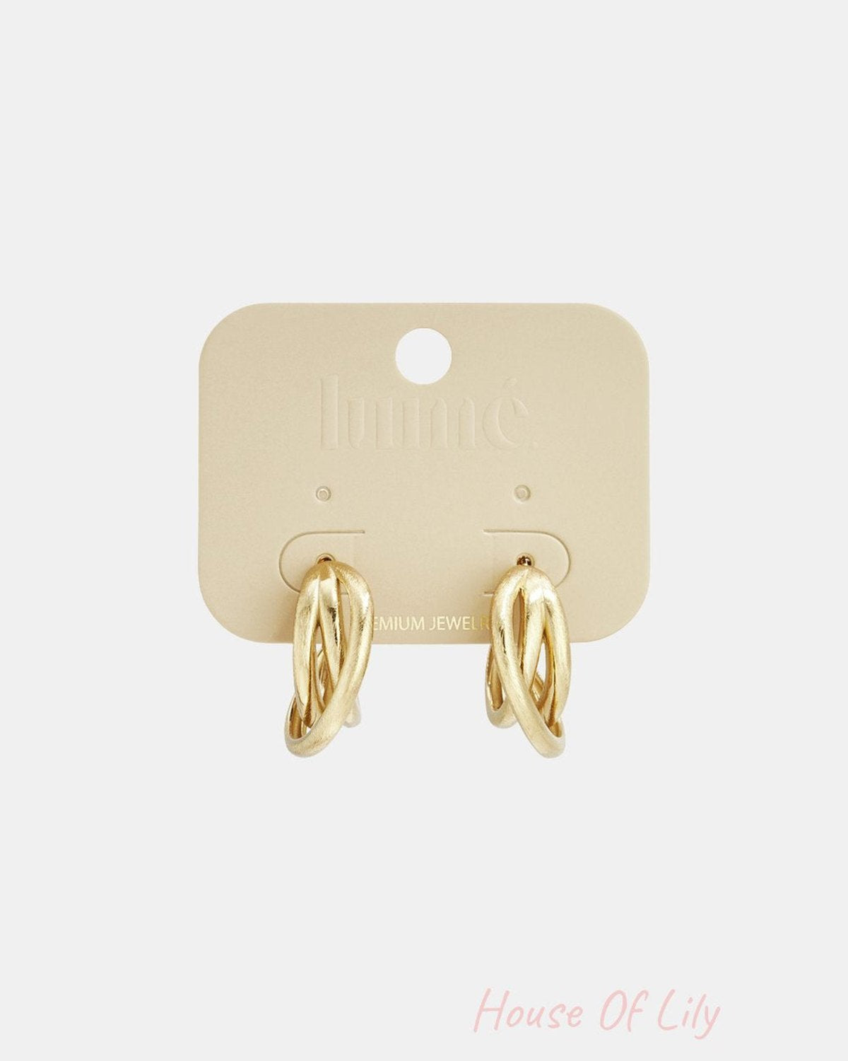 Gold-tone interlocking hoop earrings with a textured, modern finish on a Lummé branded display card.