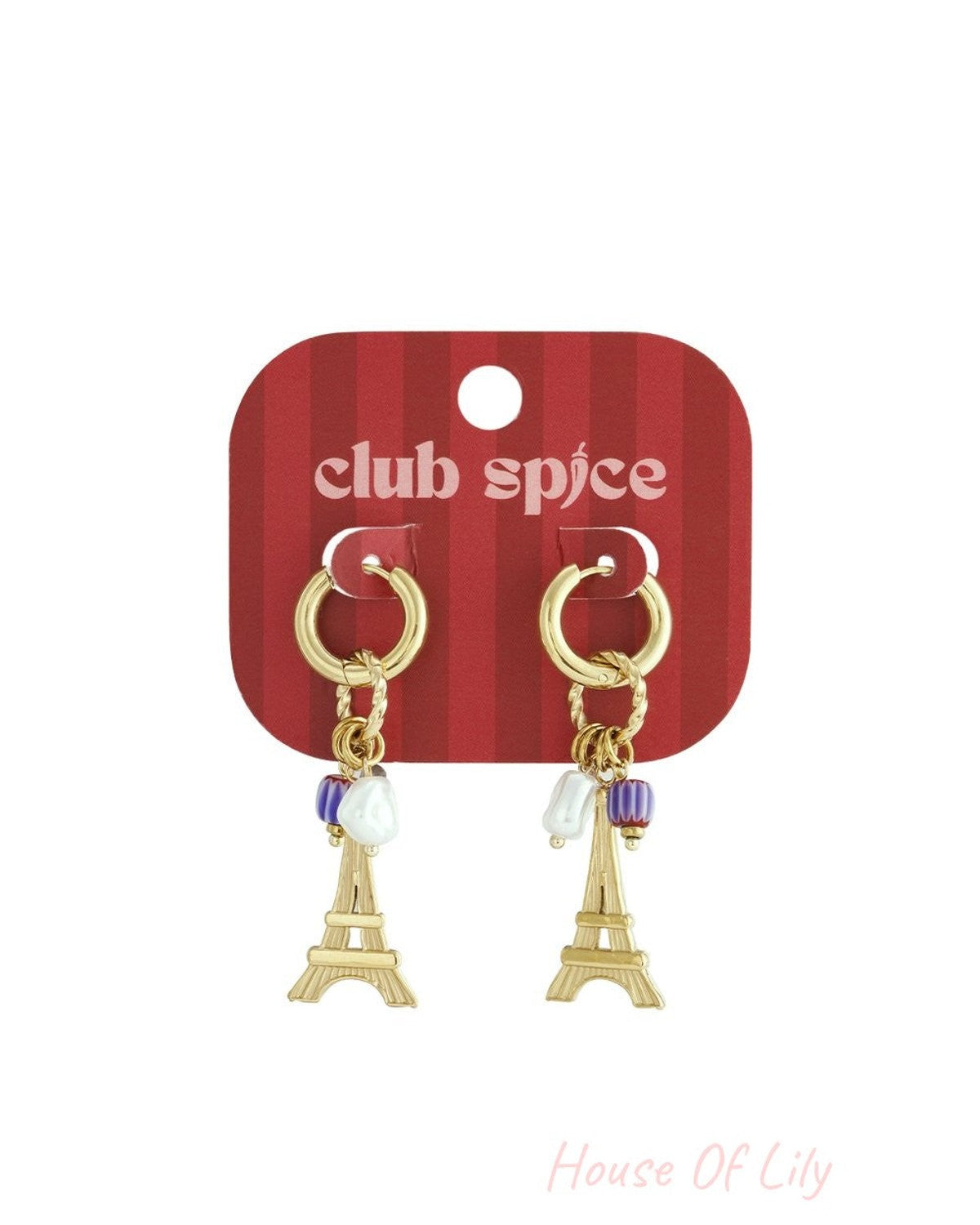 Gold hoop earrings with Eiffel Tower charms, pearl accents, and striped purple beads on a red display card.