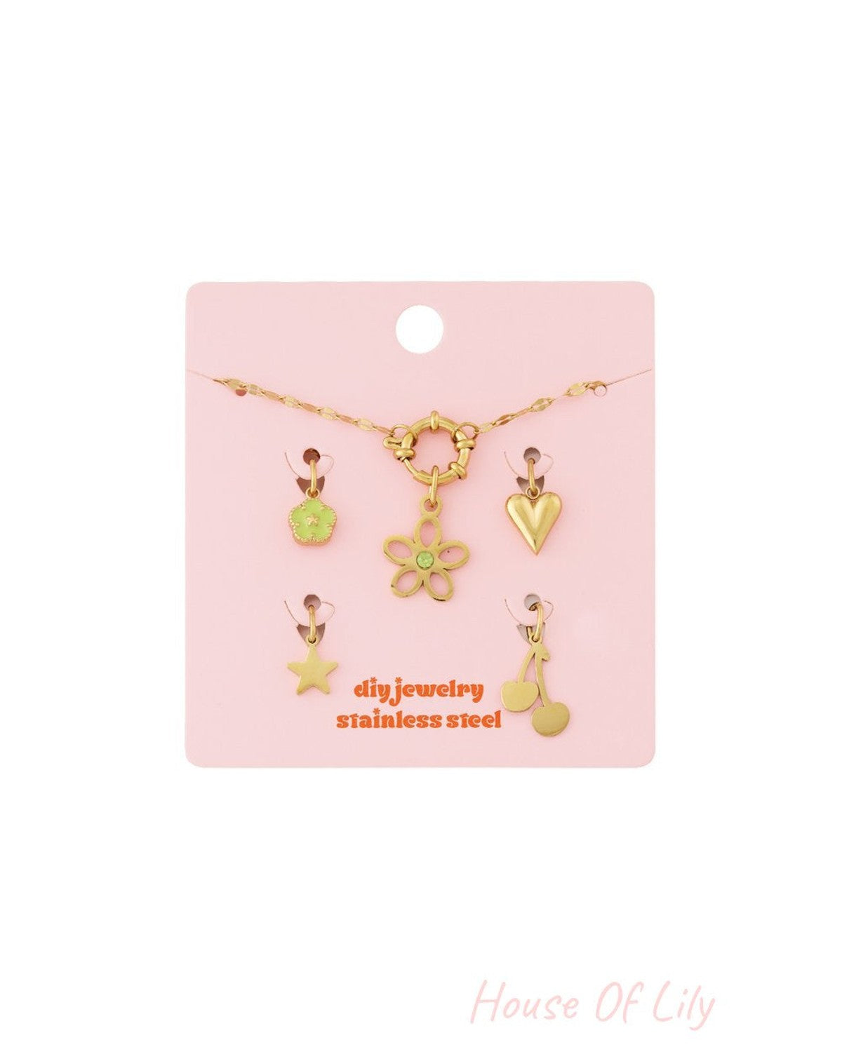 Gold stainless steel Glimmering Beaded Charm Set featuring a necklace and charms: flower, heart, star, and cherry.