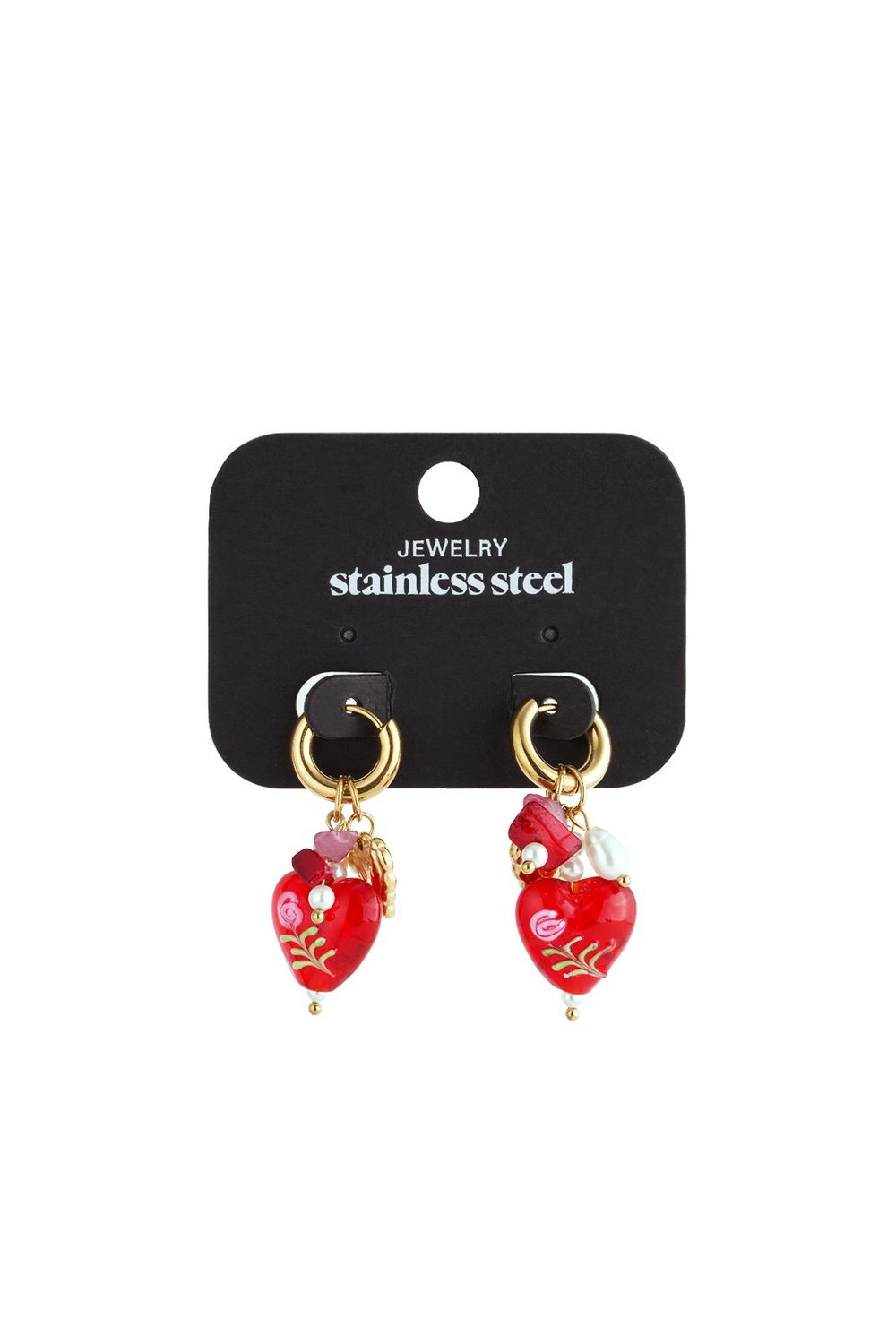 Gold hoop earrings with red heart charms featuring floral accents, small pearls, and pink beads on a display card.