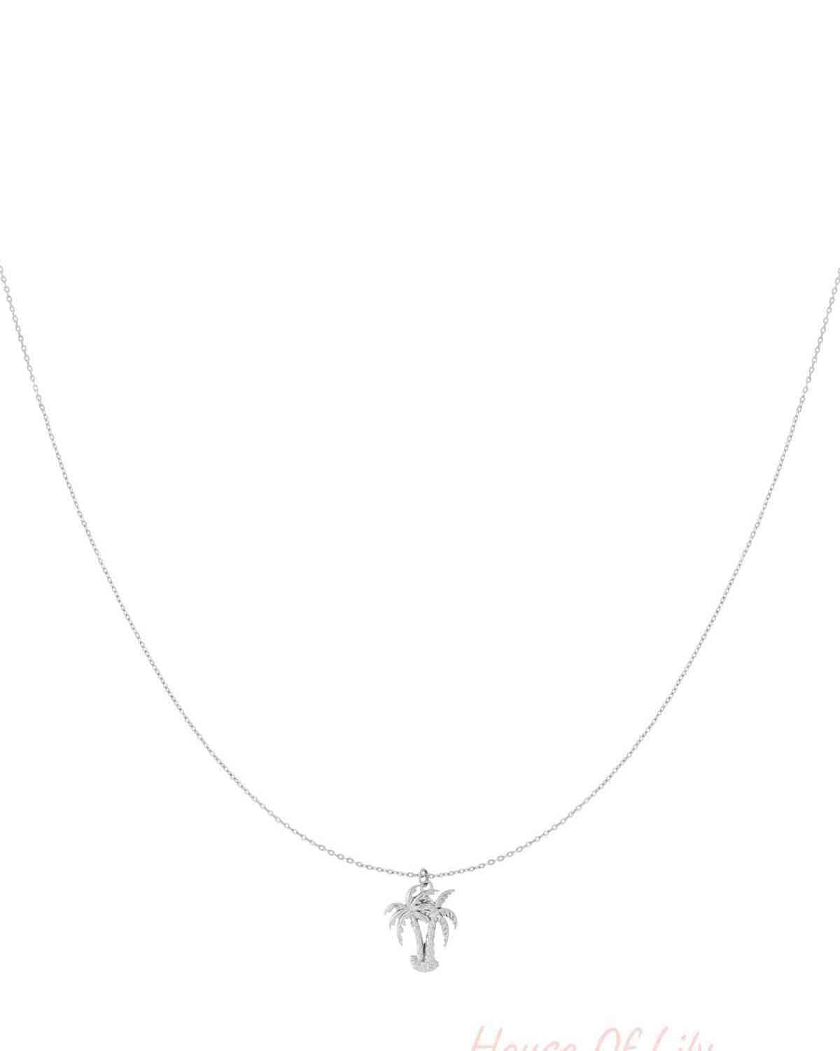 Silver pendant necklace featuring a finely crafted palm tree charm on an adjustable chain, displayed on a white background