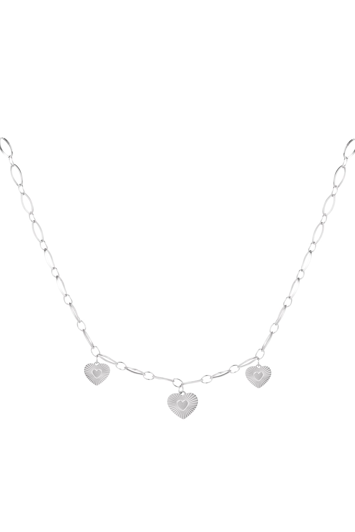 Silver version of triple heart charm necklace displayed on white background