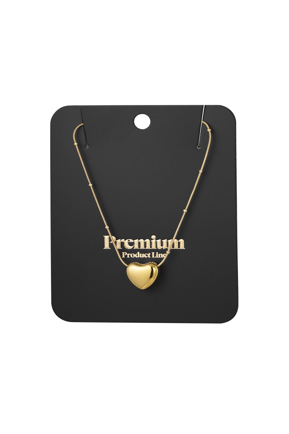 Gold heart pendant necklace displayed on black premium product line packaging card