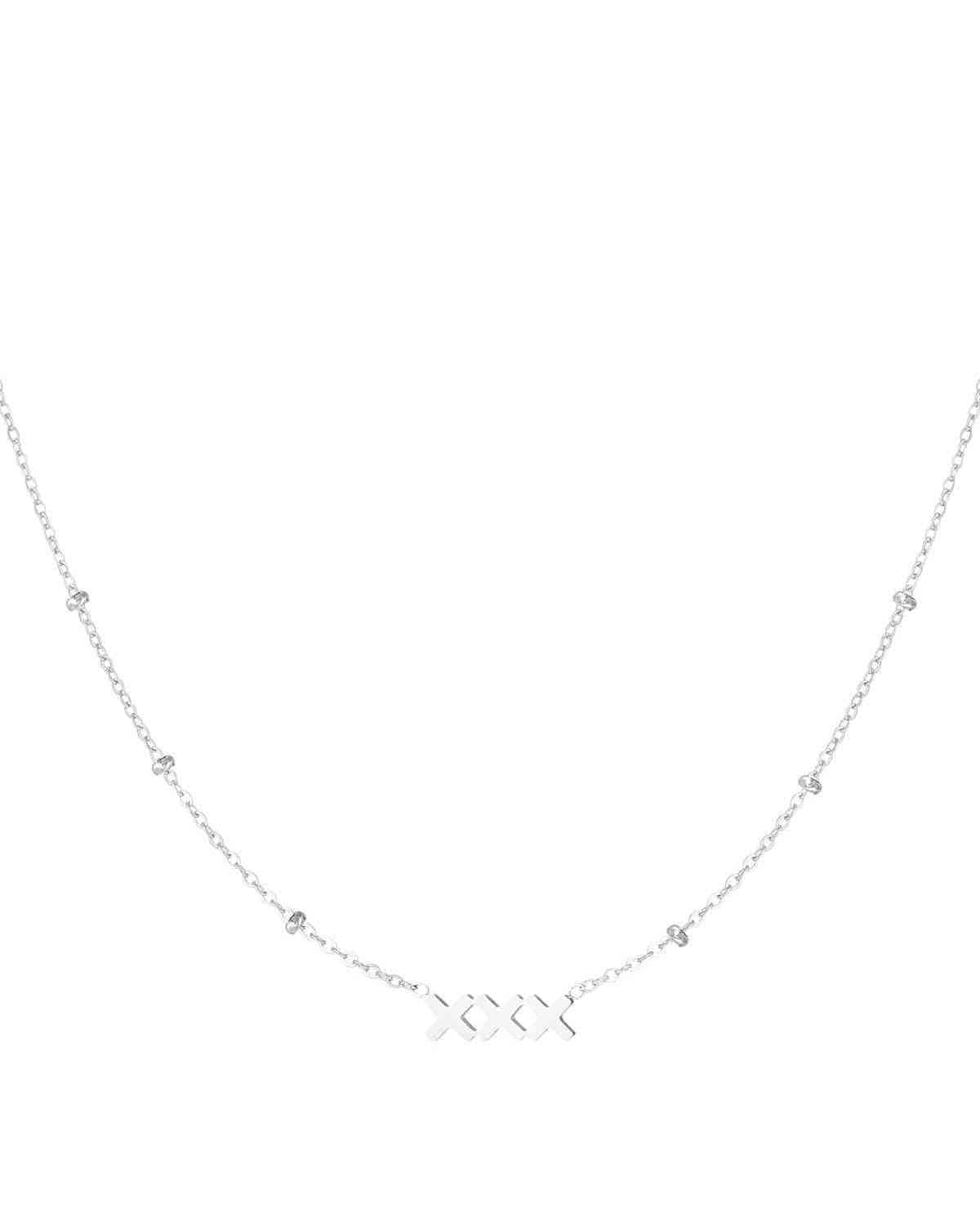 Silver minimalist necklace with XXX pendant and beaded accents on fine chain