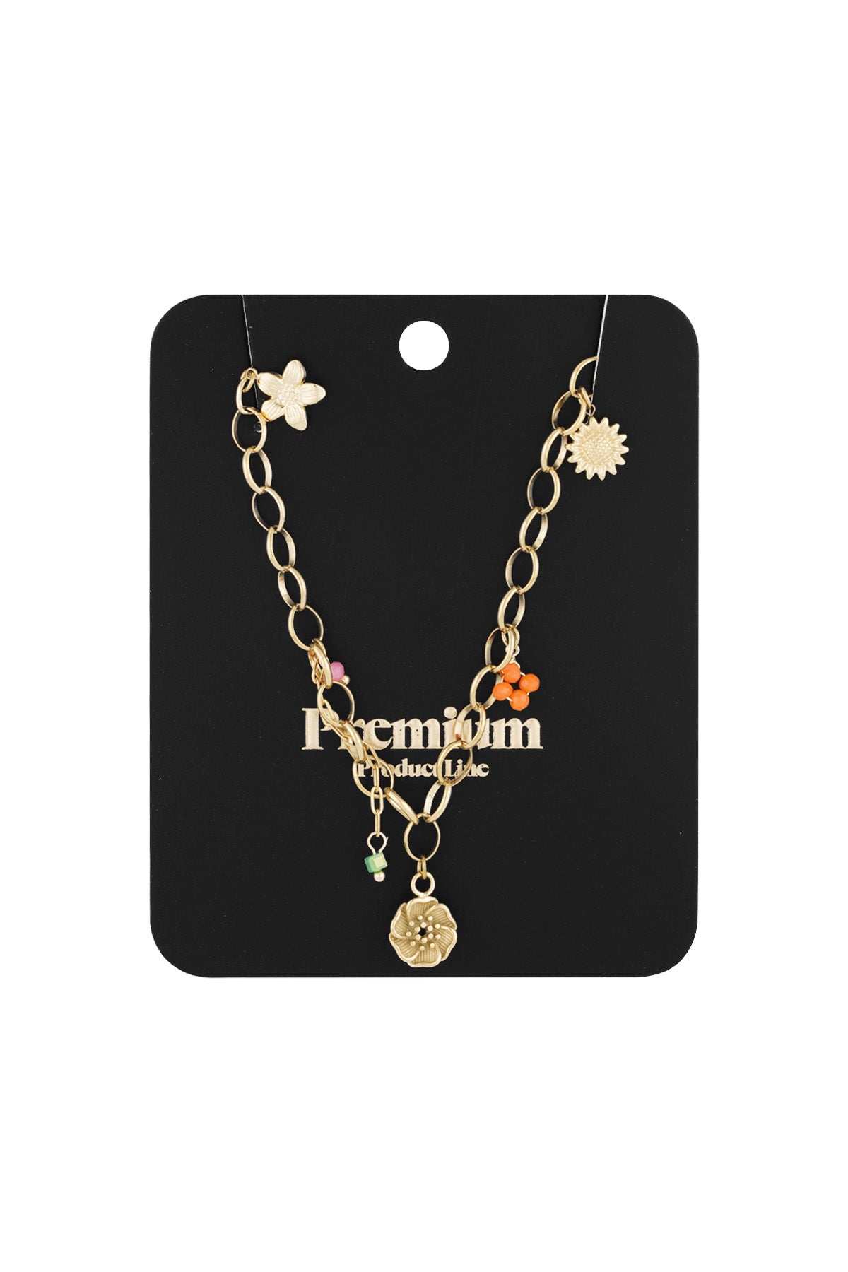 Gold chain charm necklace displayed on a black card labelled Premium Product Line