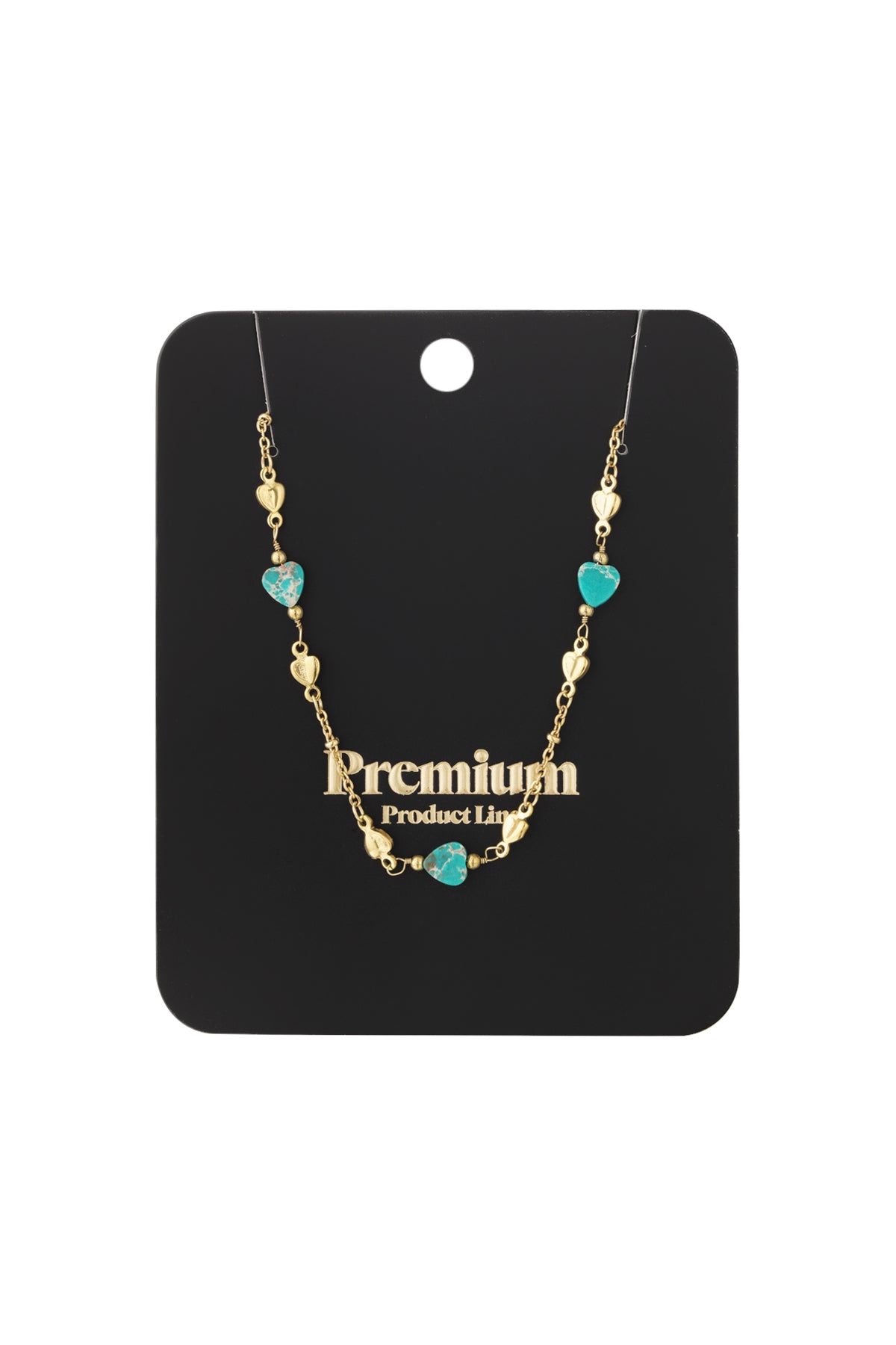 Gold-tone necklace with turquoise heart-shaped beads displayed on black branded card