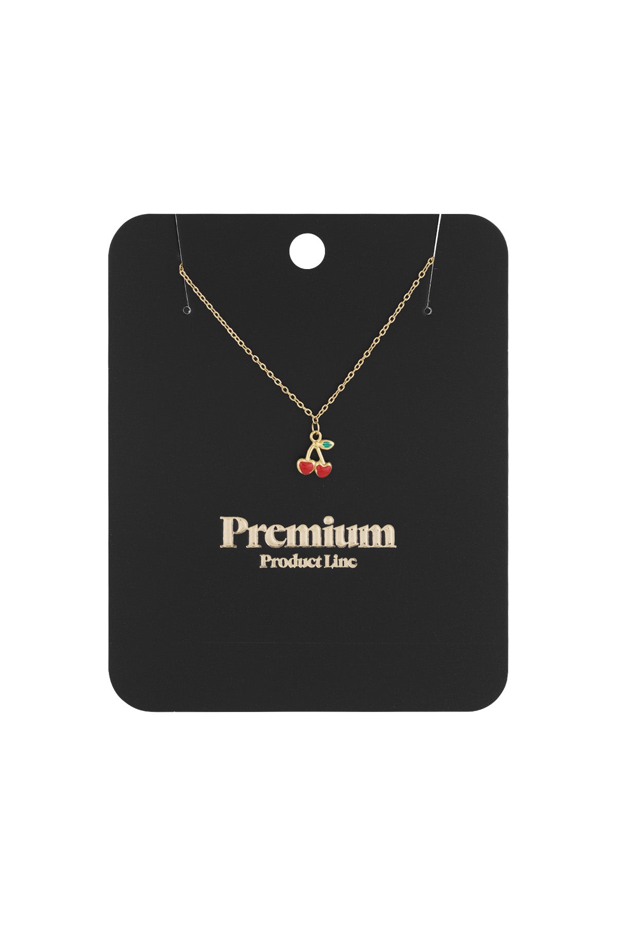 Gold-coloured chain necklace with red enamel cherry pendant displayed on black packaging card marked 'Premium Product Line'