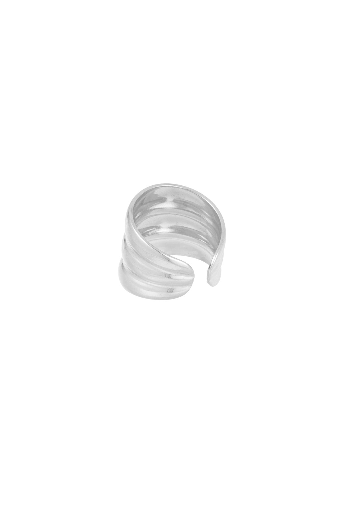 Close-up of silver statement ring showing smooth and polished layered design