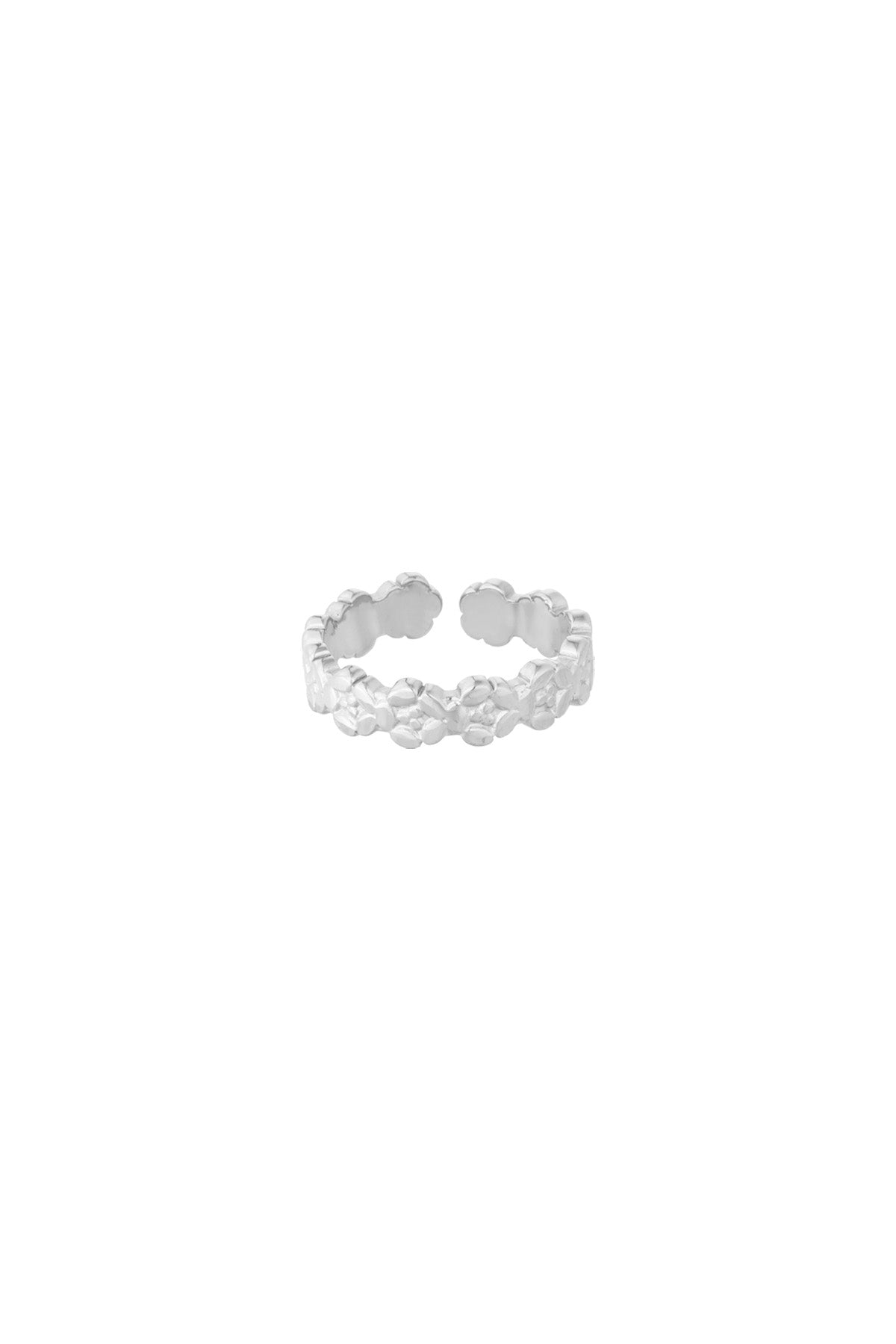 Close-up image of a silver open band ring with the same delicate embossed floral pattern on a white background