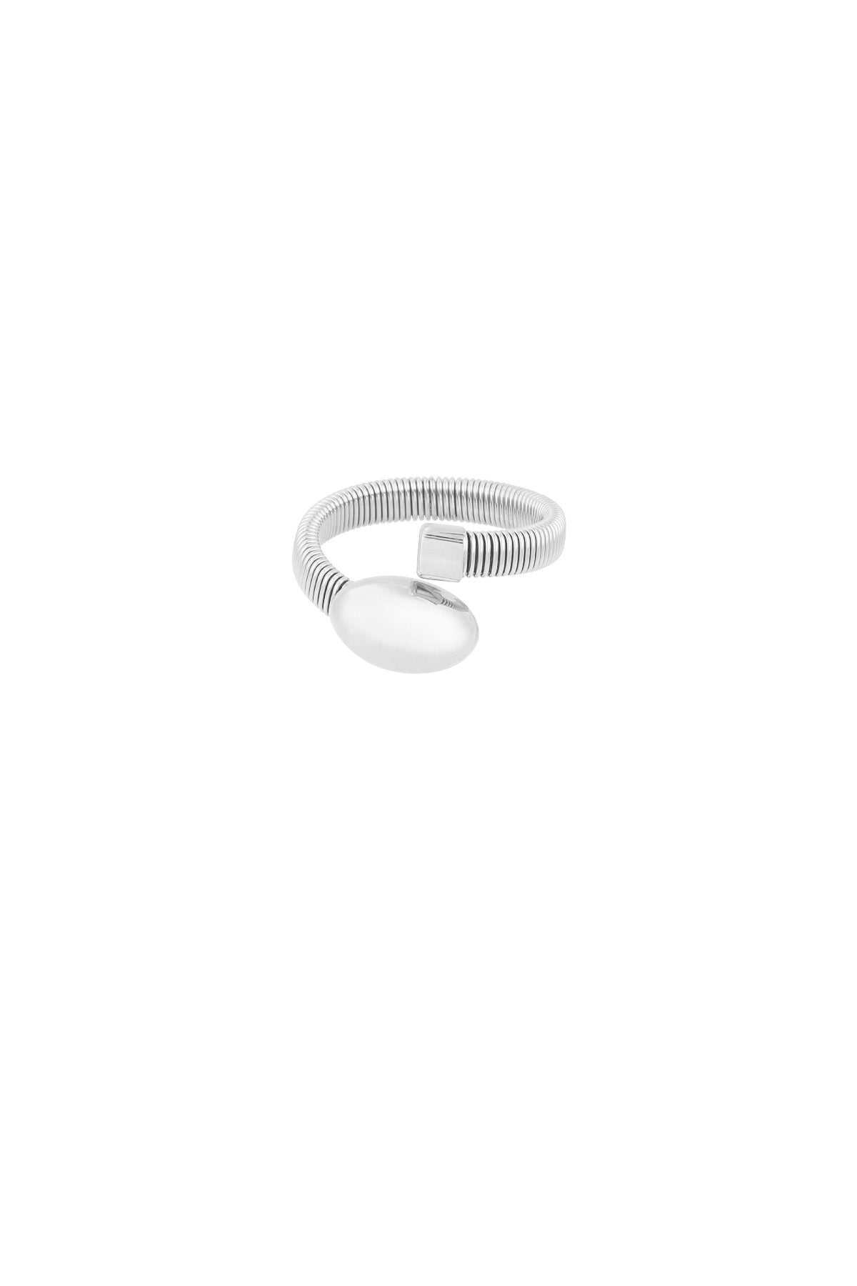 Close-up of silver-tone coil ring with oval and square ends, on white background, showing minimalist design