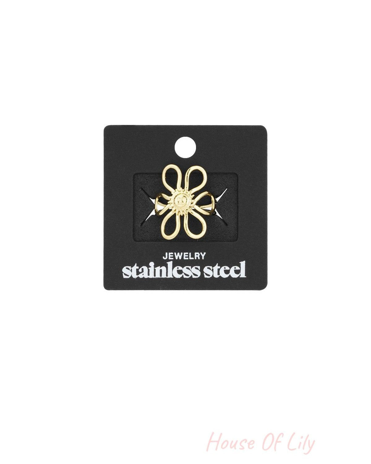 Gold-tone Sunshine Statement Ring displayed on black stainless steel jewelry card with 'stainless steel' printed on it