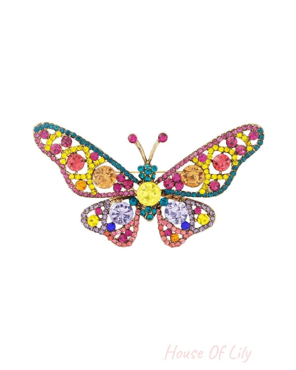 Close-up of multicolor butterfly brooch with pink, yellow, blue, and purple rhinestones set on gold alloy