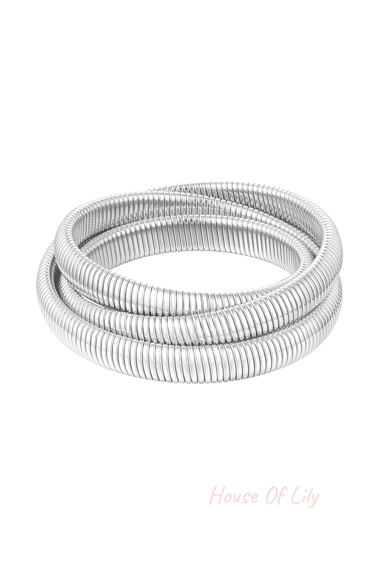 Silver-tone triple coil wrap bracelet with ribbed texture displayed on white background