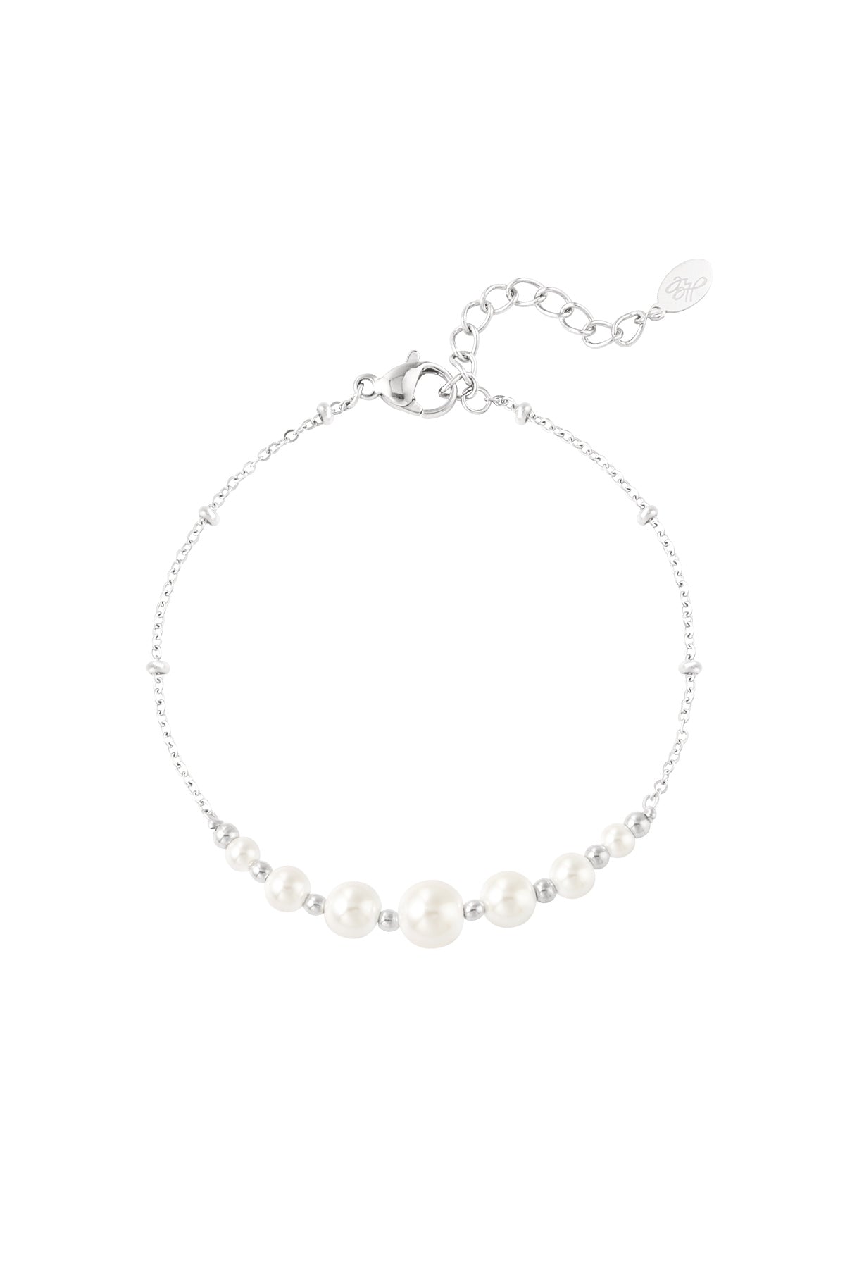 Close-up of a delicate silver chain bracelet with white pearl beads and small silver beads on a white background