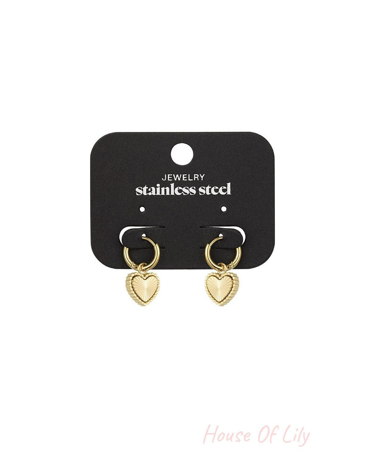 Gold hoop heart charm earrings displayed on black packaging card labelled stainless steel