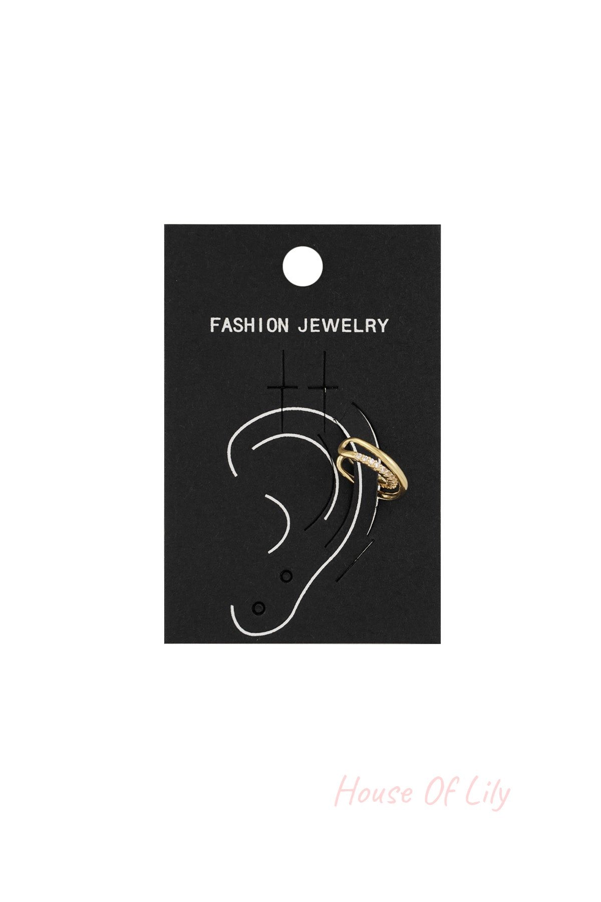 Gold spiral ear cuff attached to a black fashion jewelry card showing ear positioning