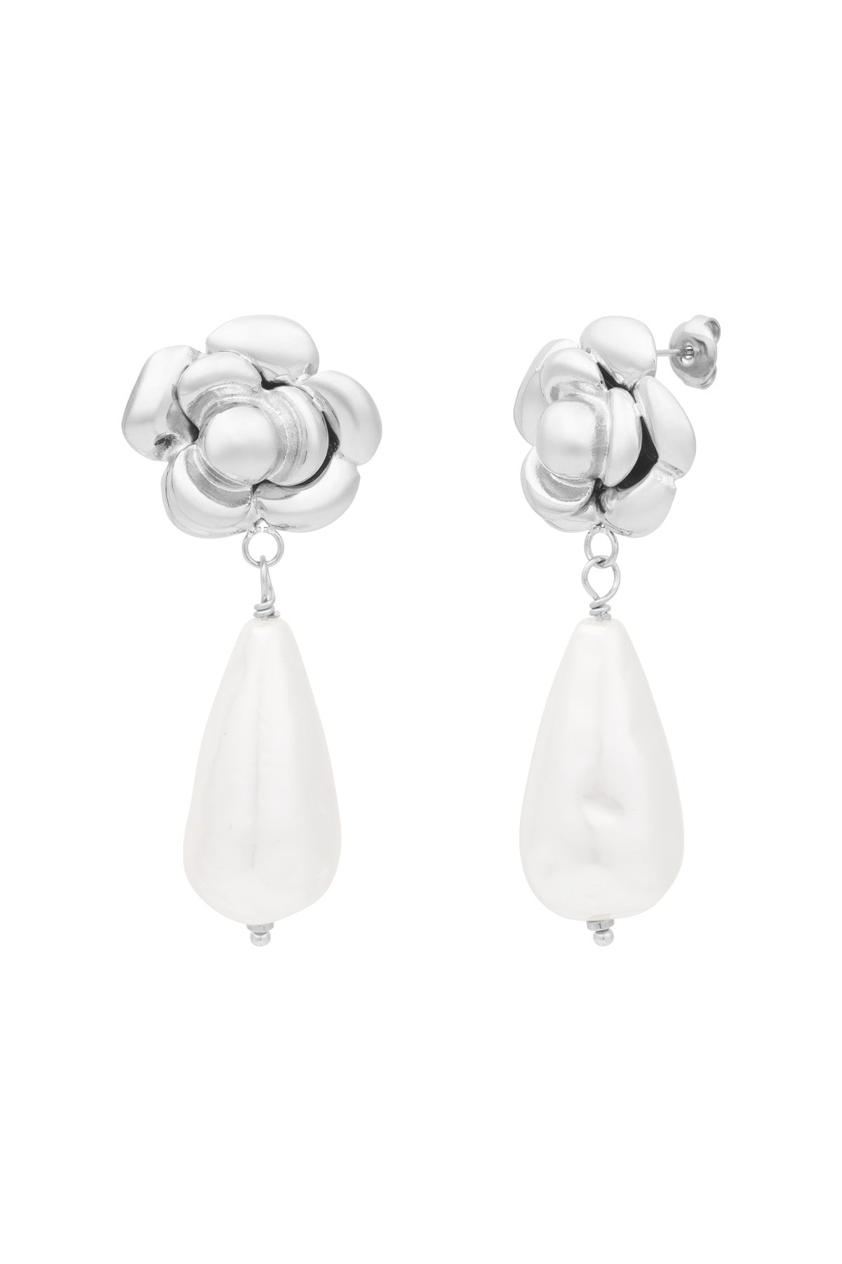 Silver rose shaped earrings with white teardrop pearl drops isolated on white background