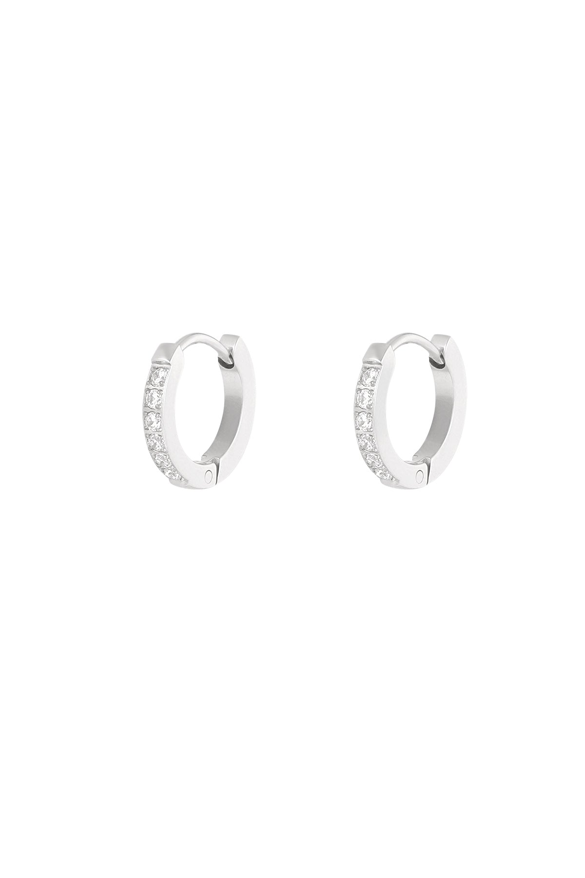 Pair of silver mini hoop earrings decorated with sparkling clear stones shown on white background