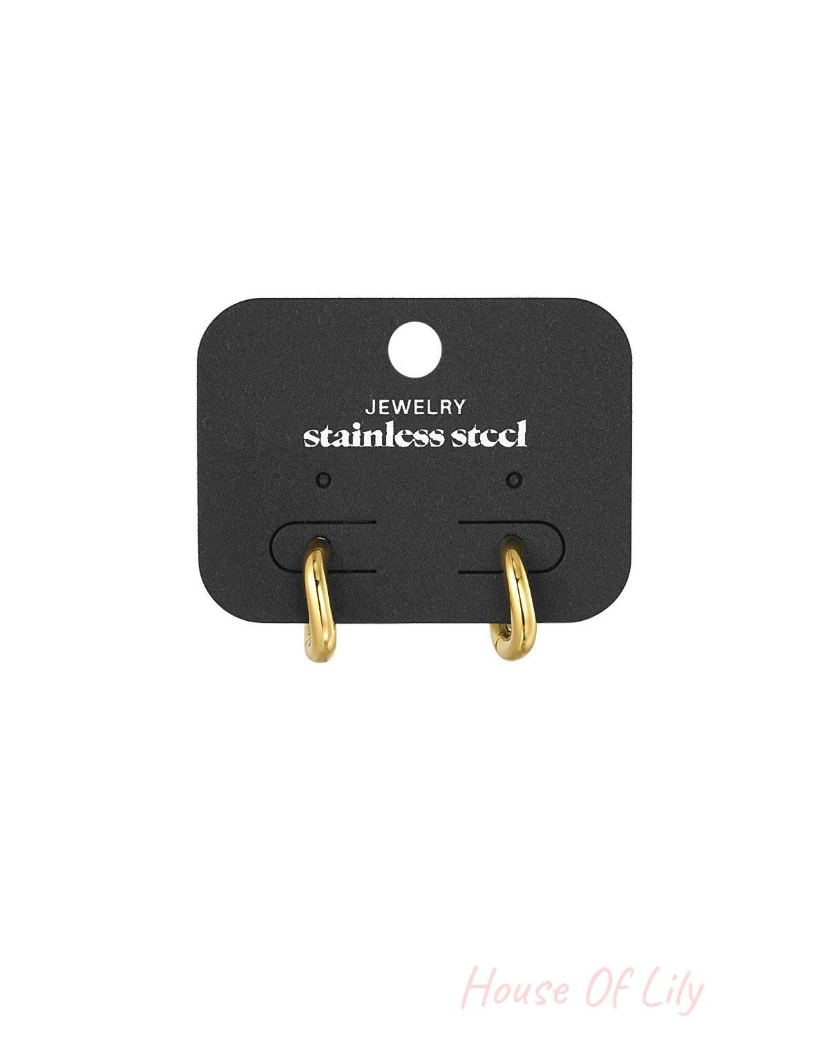 Gold hoop earrings displayed on black holder with 'Jewelry stainless steel' text