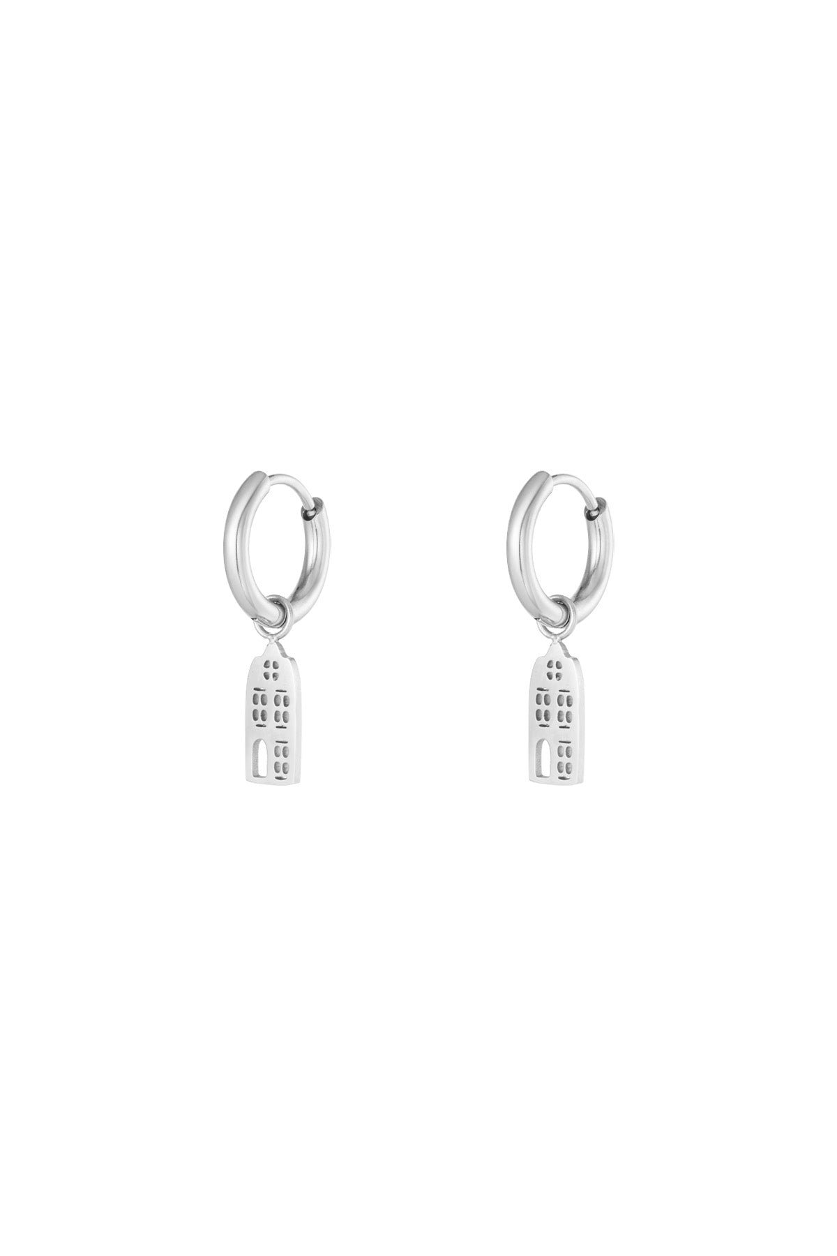 Pair of silver drop hoop earrings with narrow building-shaped dangling charms on a white background