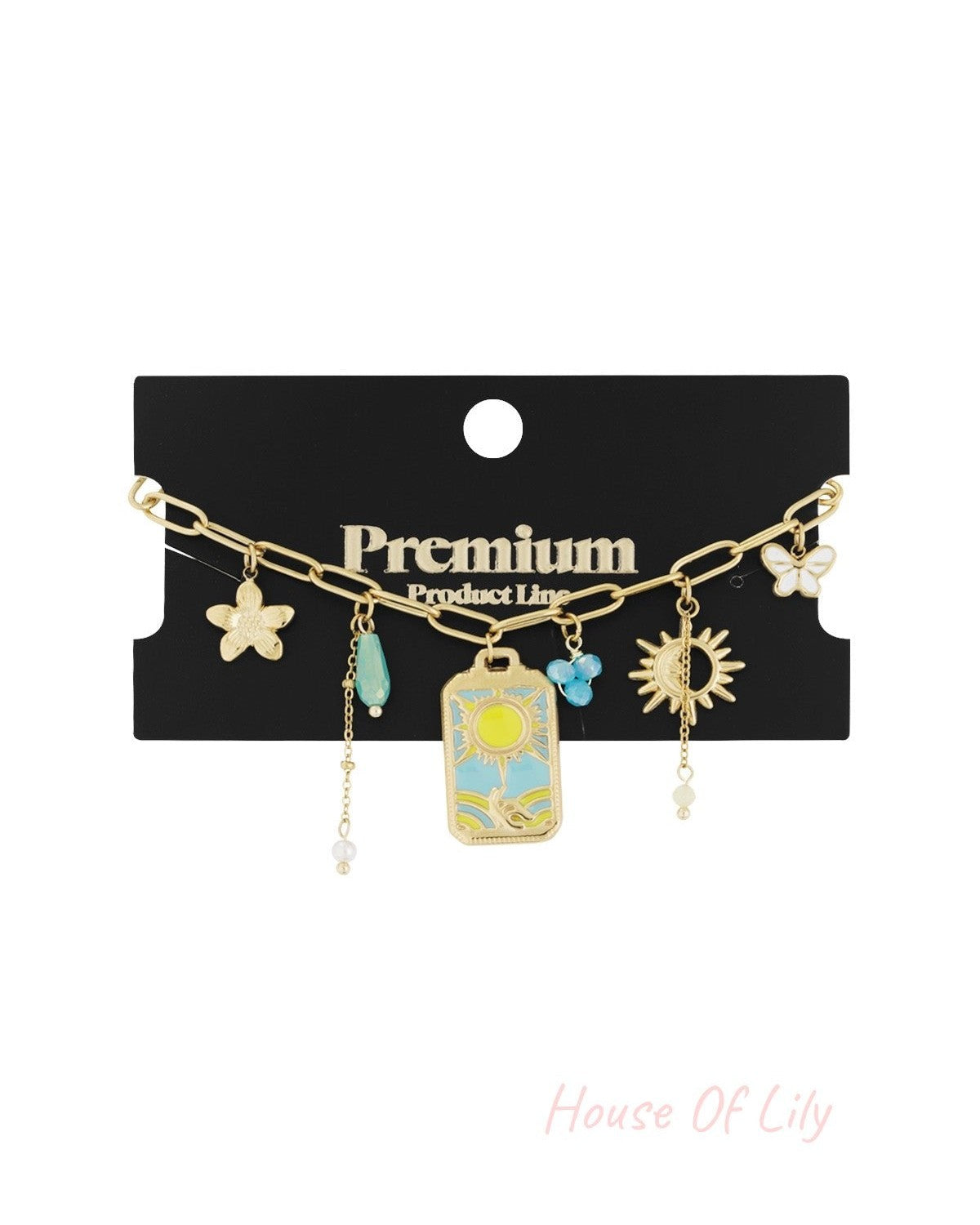Gold-tone charm bracelet displayed on a black Premium product card showcasing detailed colourful charms