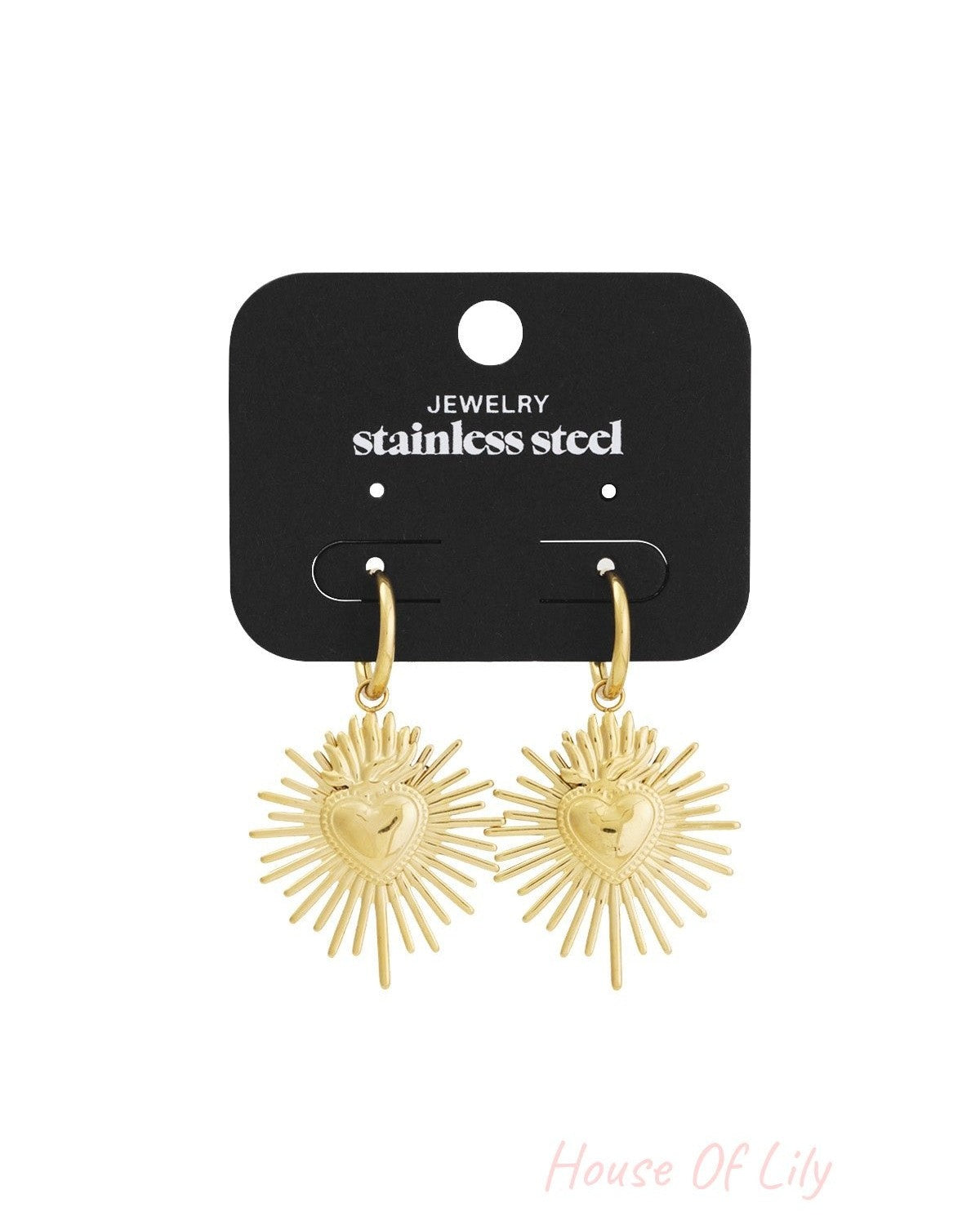 Gold Milagros heart sunburst earrings displayed on black jewelry card labeled stainless steel