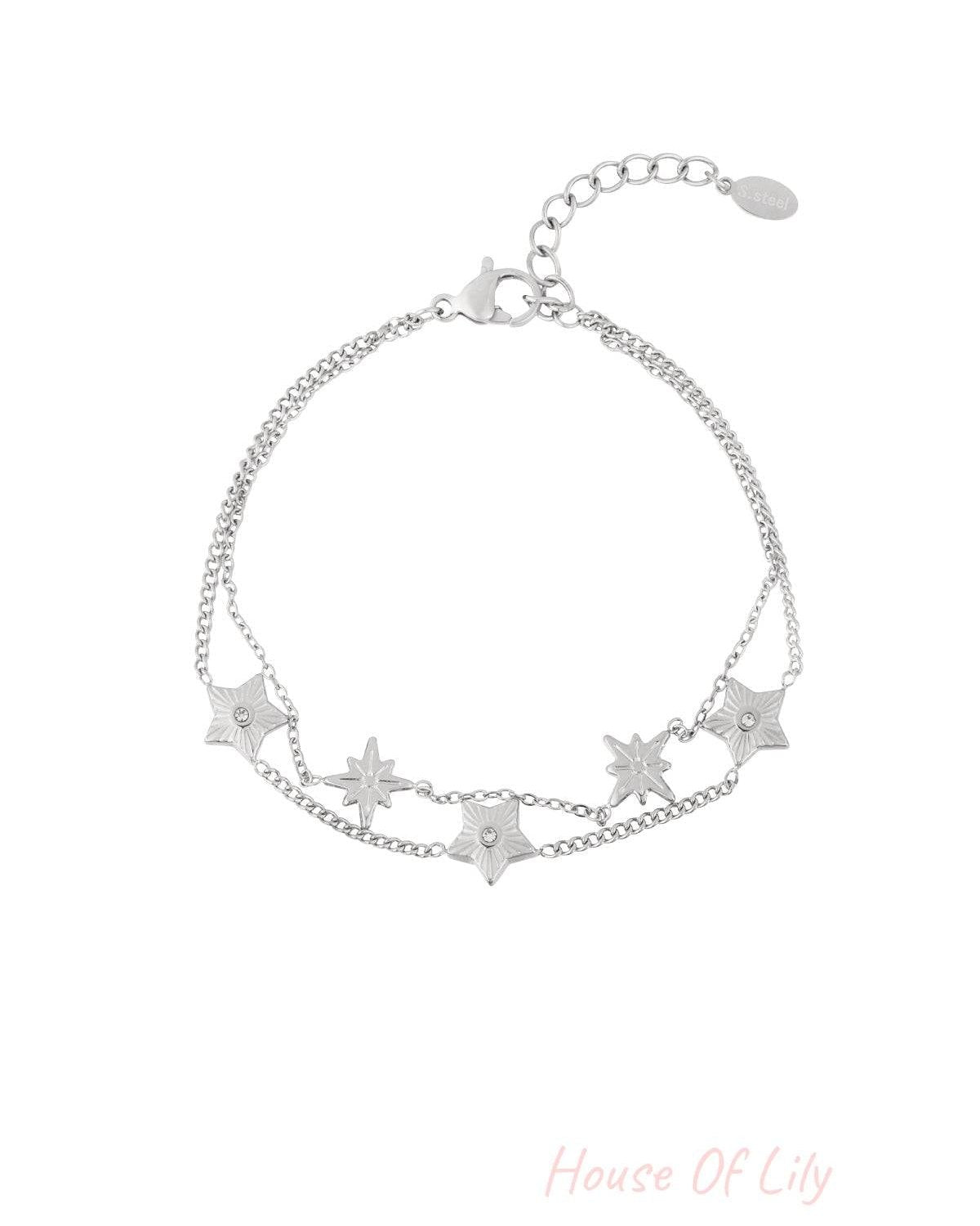 Silver double-chain bracelet featuring star-shaped charms with rhinestone centres and an adjustable clasp