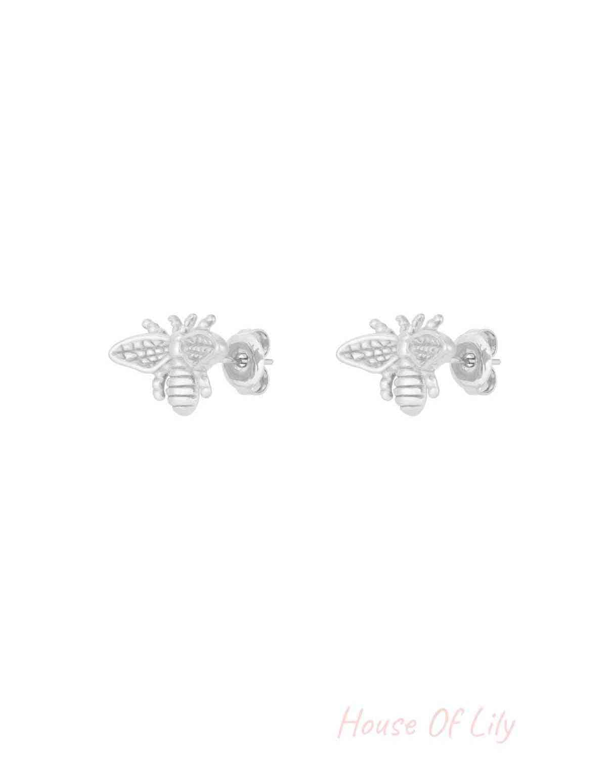 Silver-tone bee motif stud earrings shown on white background