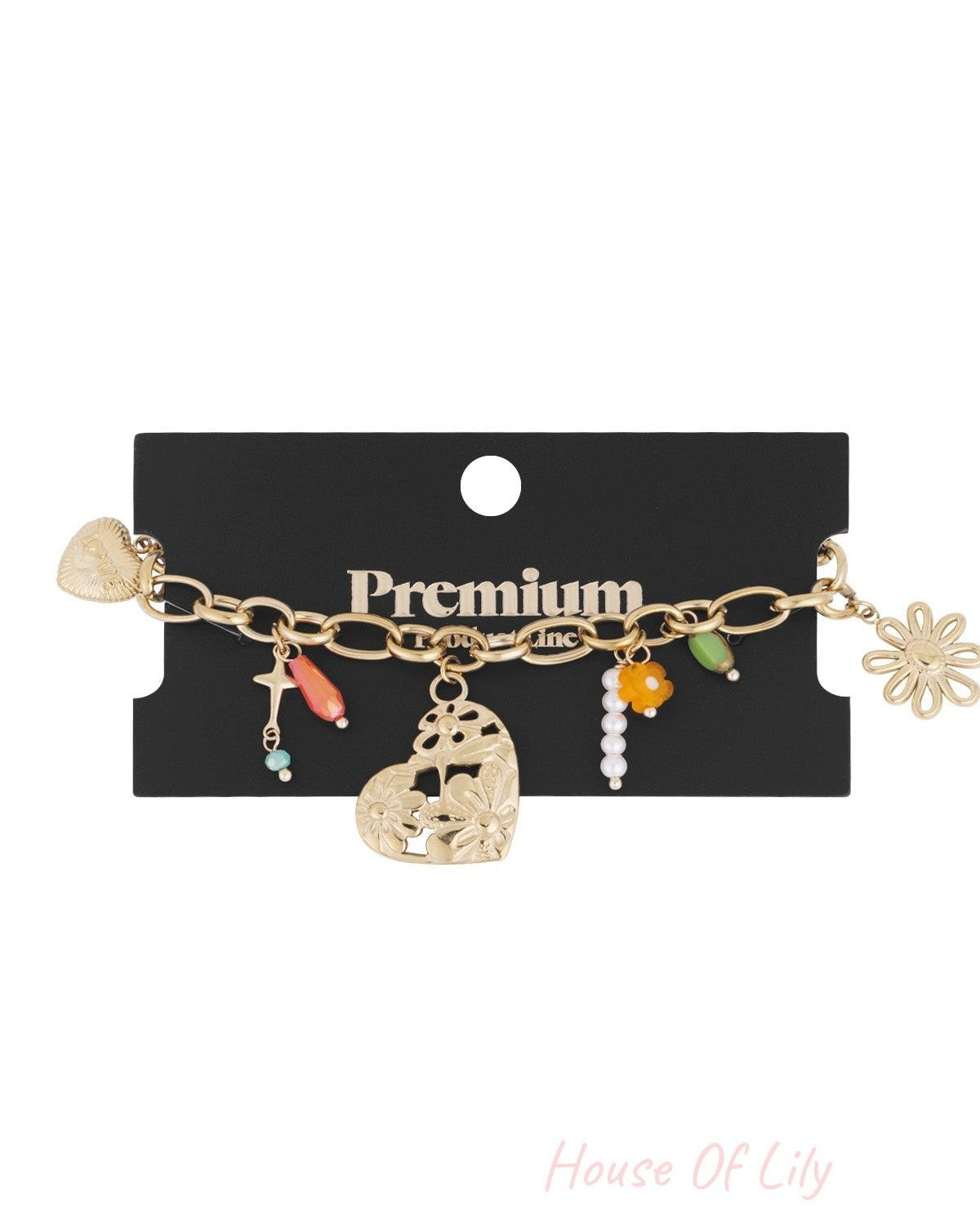 Gold charm link bracelet displayed on black branded card packaging labelled 'Premium', highlighting the assortment of floral and colourful charms
