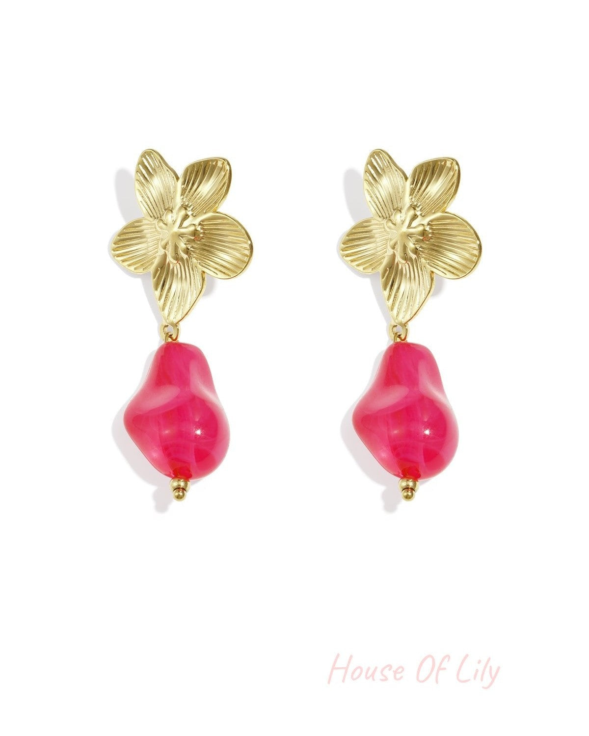 Gold-tone earrings featuring a textured flower stud and a dangling, smooth, pear-shaped hot pink resin drop.