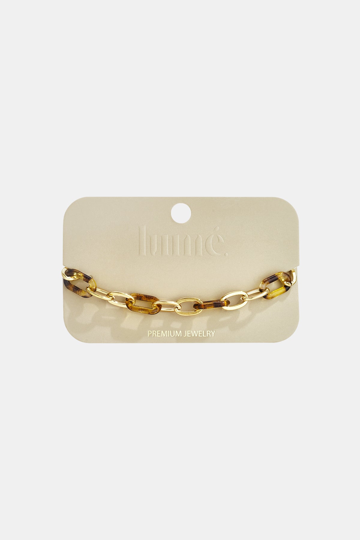 Wild Cat Chain Link bracelet featuring alternating gold and tortoiseshell-patterned resin oval links on a display card.