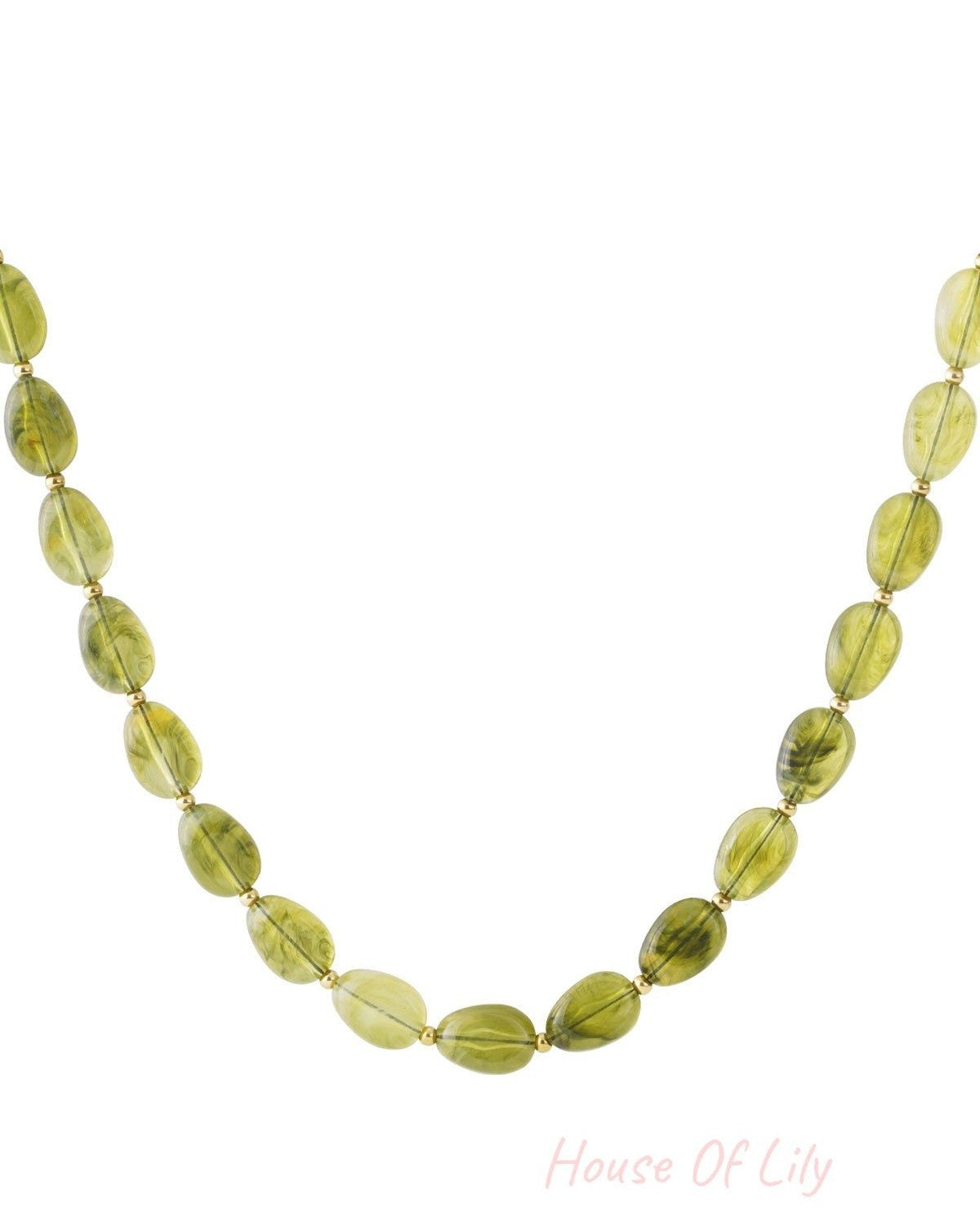Olive green acrylic beaded necklace with gold spacer beads arranged against white background