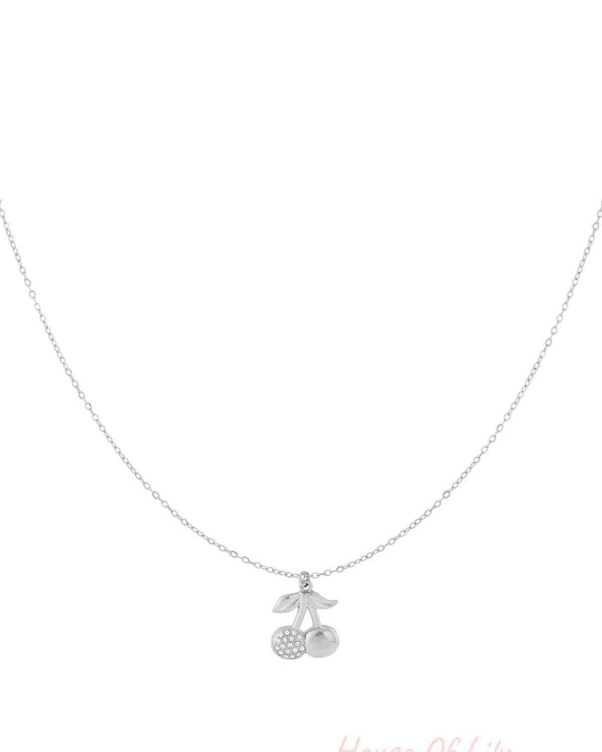 Silver cherry pendant necklace with one rhinestone cherry and one smooth cherry on a delicate silver chain against white background