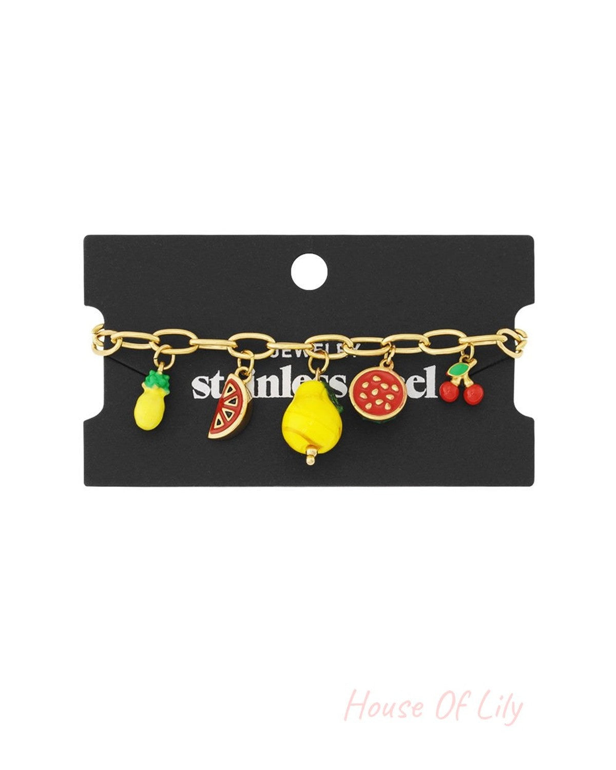 Gold-tone chain charm bracelet featuring colorful, whimsical enamel fruit charms like pineapple, melon, and cherries.