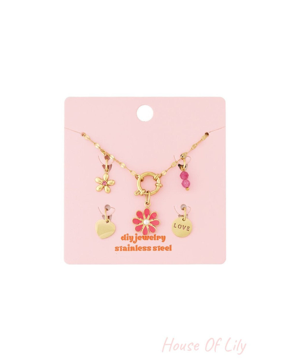 Gold-tone stainless steel DIY jewelry charm set featuring floral, heart, and "LOVE" charms with pink enamel accents.