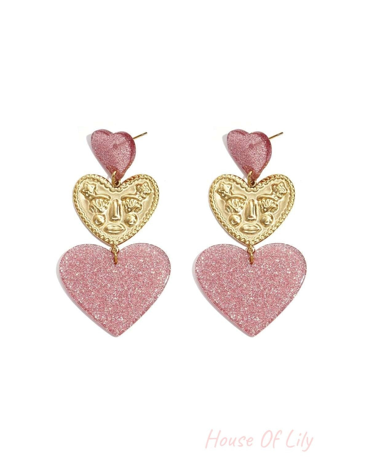 Statement earrings with glitter hearts