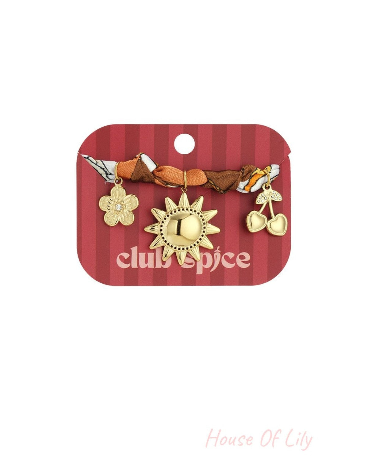 Golden Summer Sun bracelet on display, featuring a twisted patterned fabric band with sun, flower, and cherry gold charms.