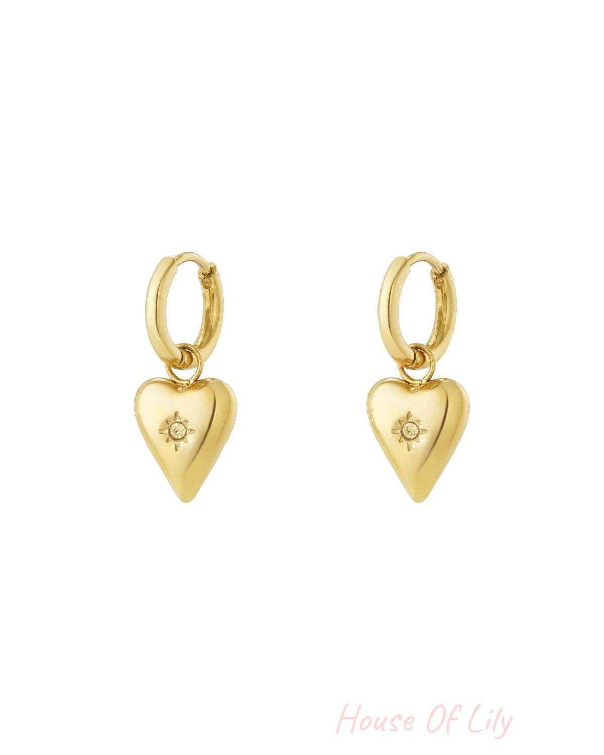 Gold-plated heart charm earrings with violet purple birthstone centre on hoop backings