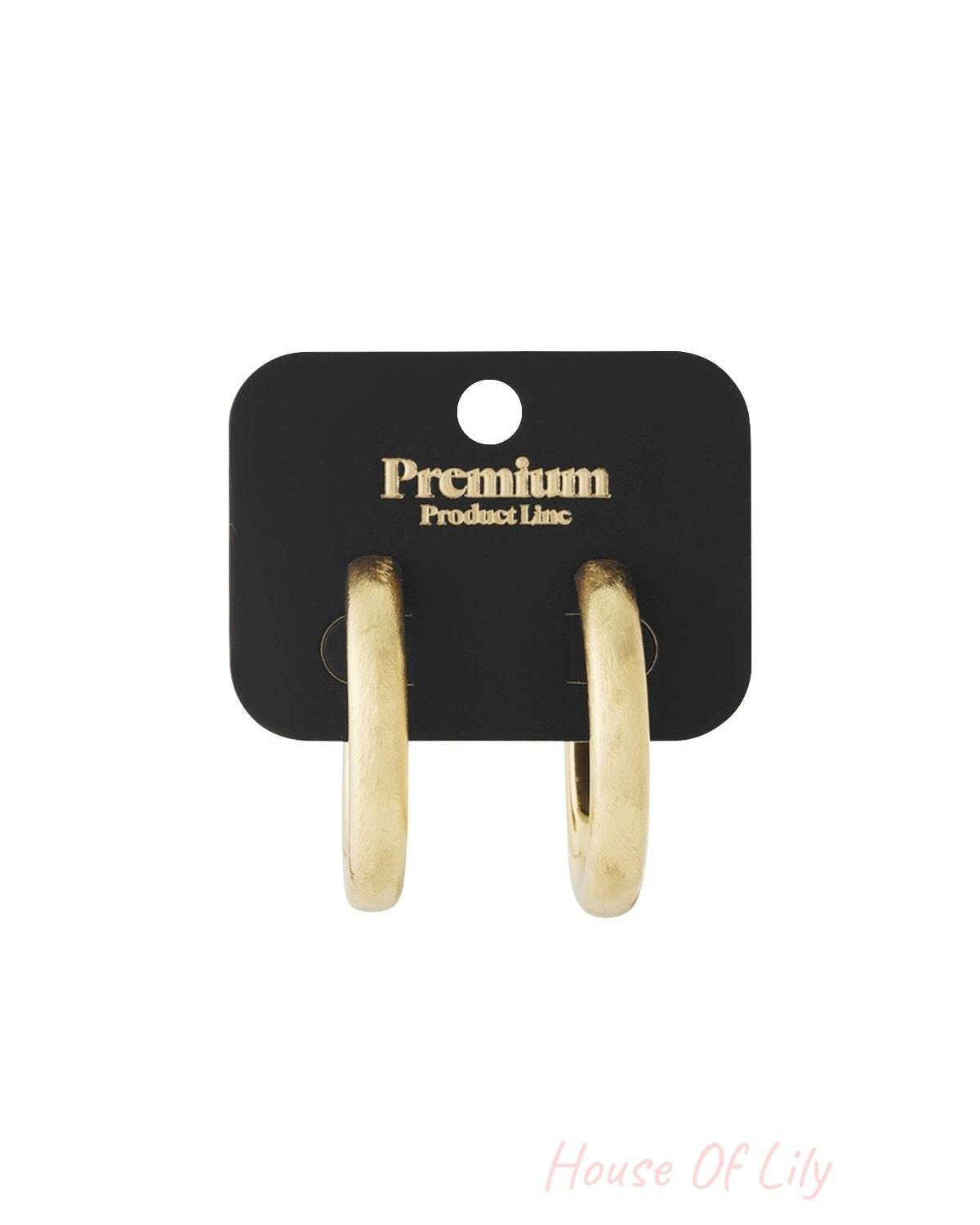 Mixed Metal Mood Hoops: Thick, brushed gold-tone hoop earrings displayed on a black "Premium" branded jewelry card.