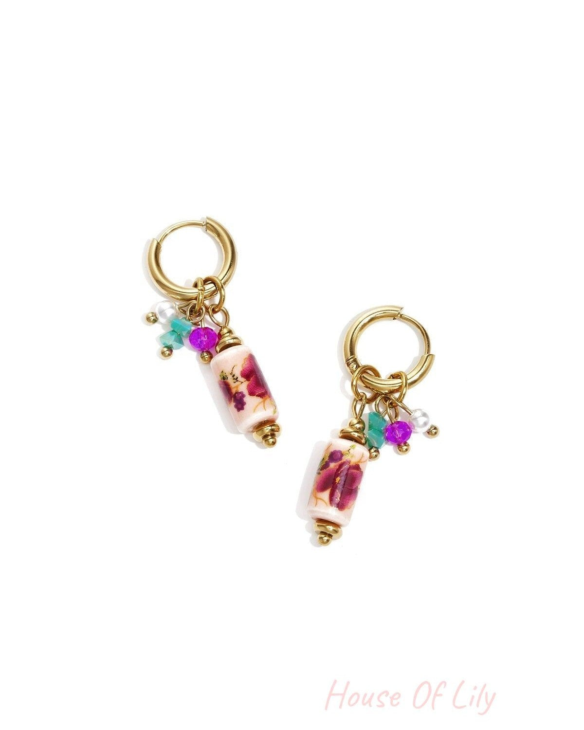 Earrings with dangling beads and a floral print