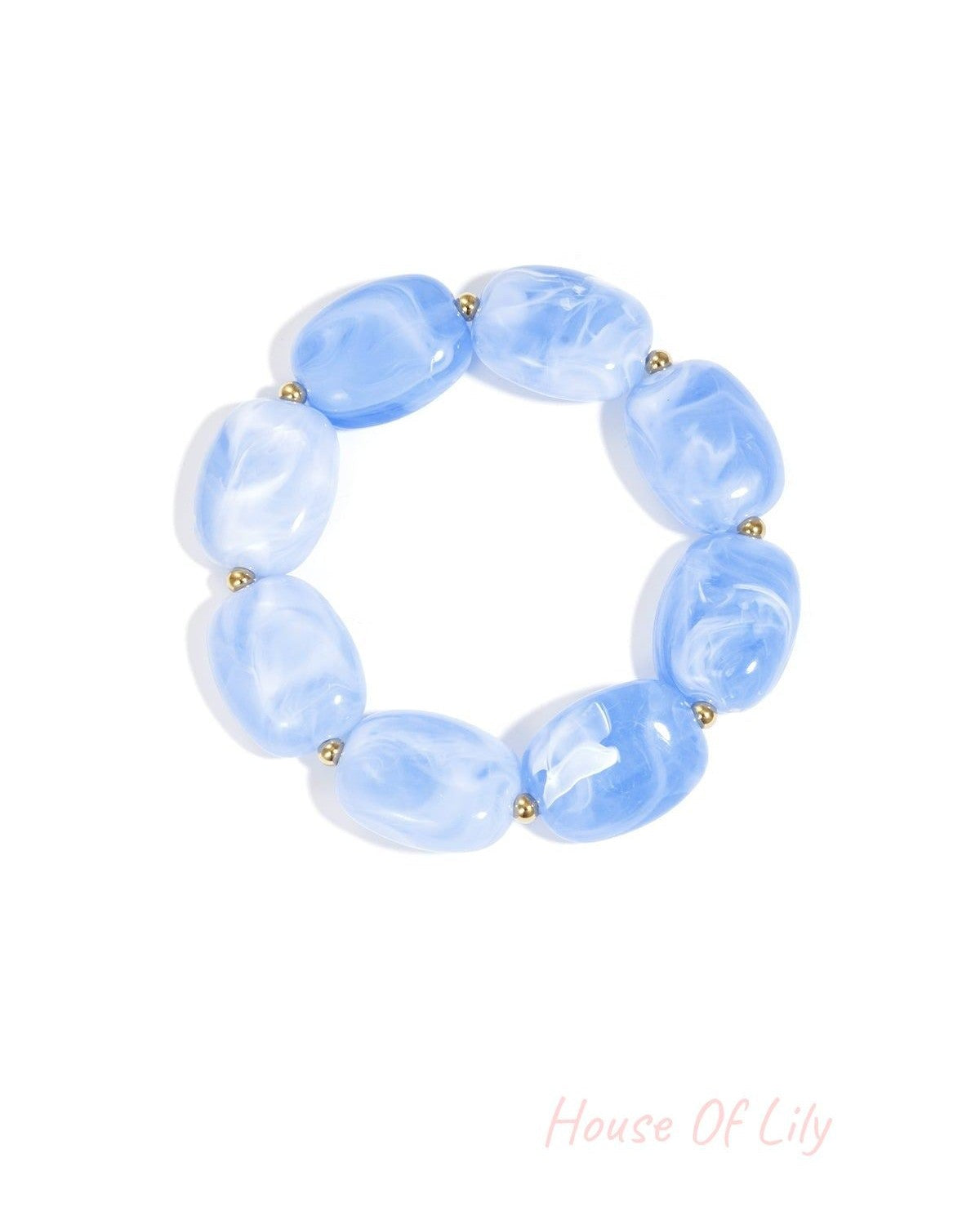 Swirled baby blue acrylic beaded stretch bracelet with gold-toned spacers displayed flat on white background