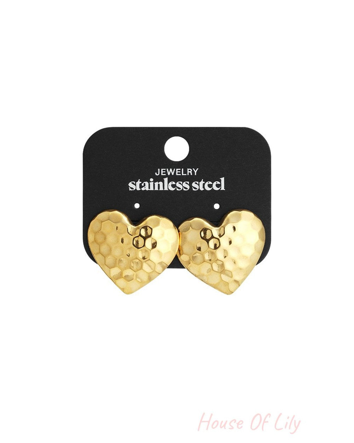 Gold-toned stainless steel heart stud earrings with a hammered, bumpy texture on a black display card.