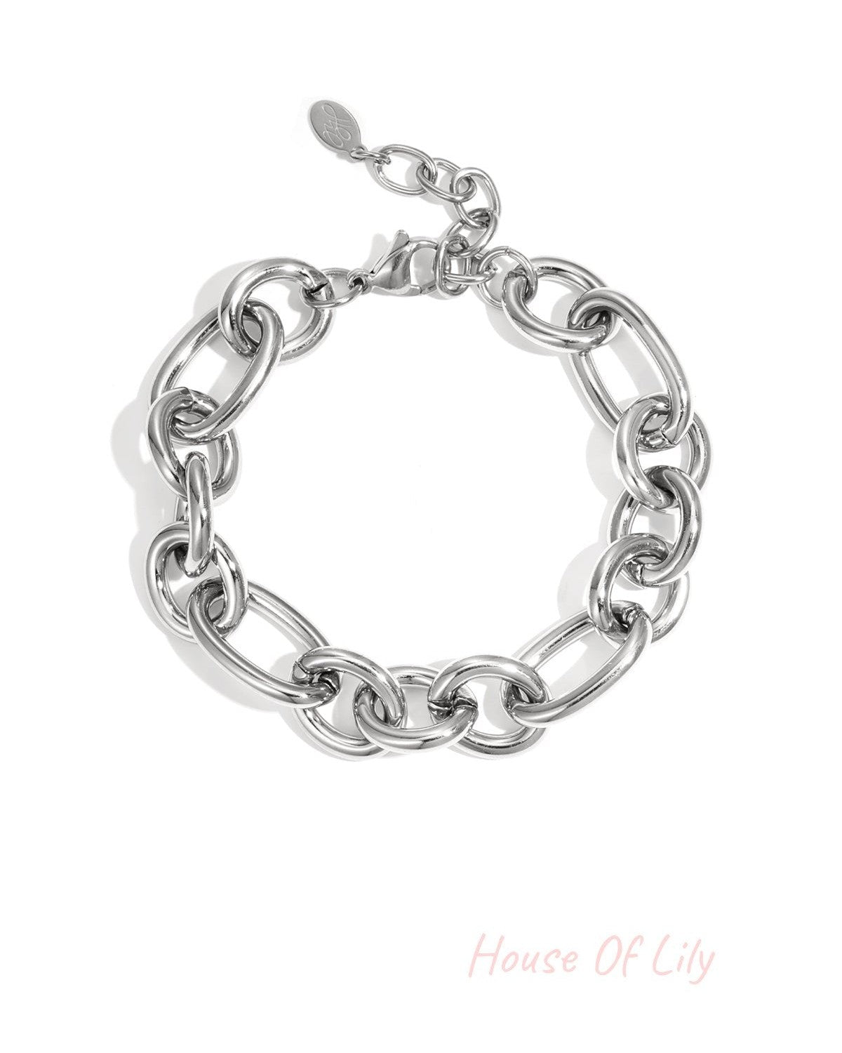 Silver chunky chain bracelet with large oval links and lobster clasp on white background