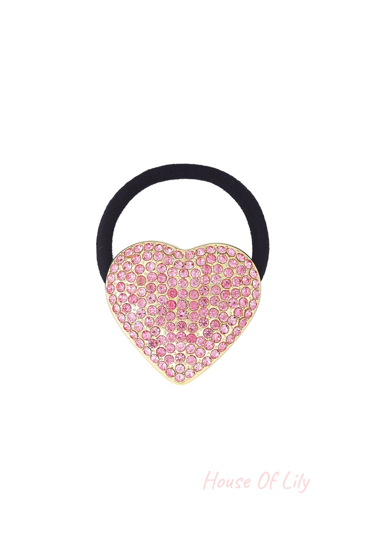Black elastic hair tie with a gold-tone heart charm encrusted with pink sparkling crystals on a white background