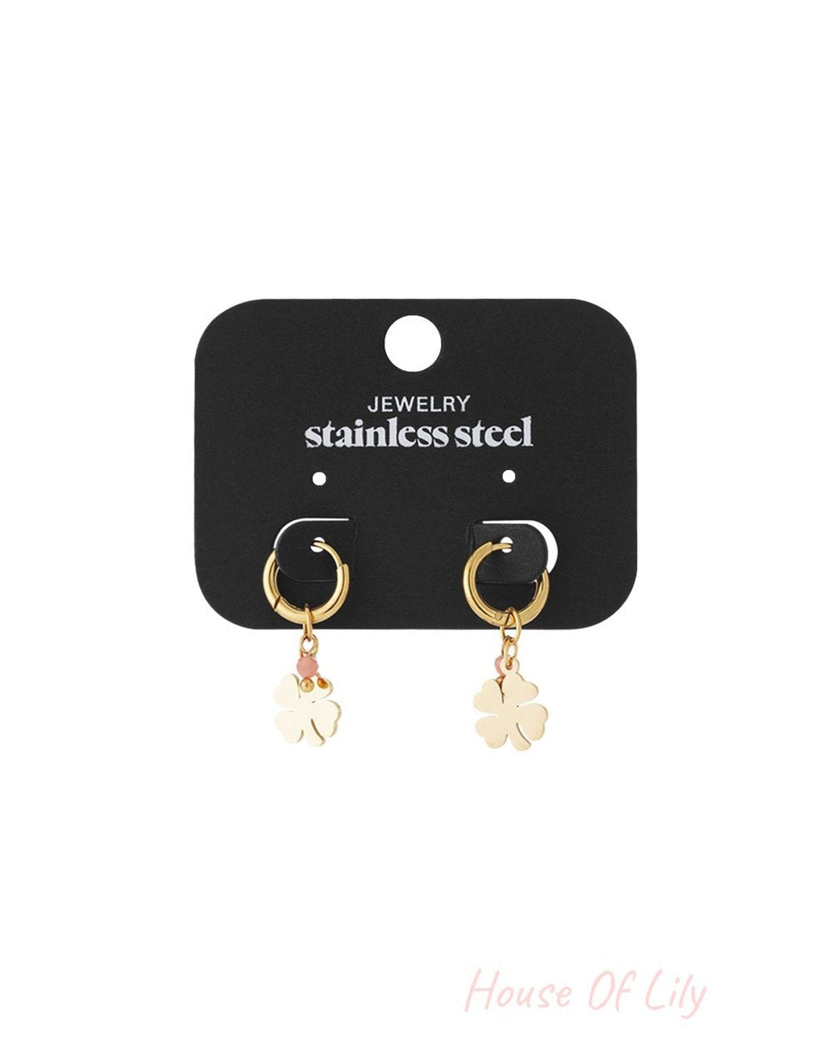 Gold stainless steel hoop earrings with small pink beads and four-leaf clover charms on a black display card.
