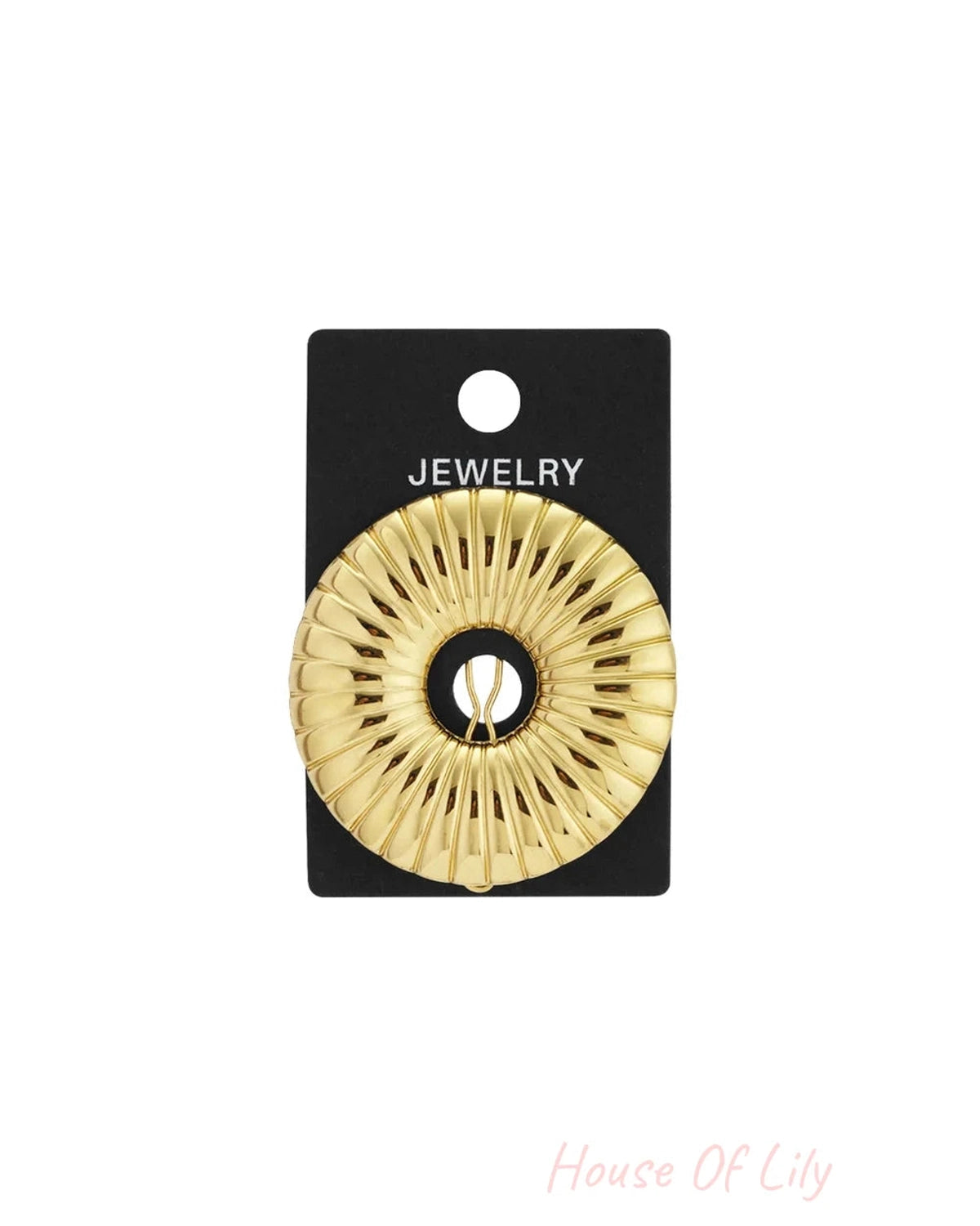 Gold-tone circle clip brooch with a radial striped, ribbed texture on a black jewelry display card.