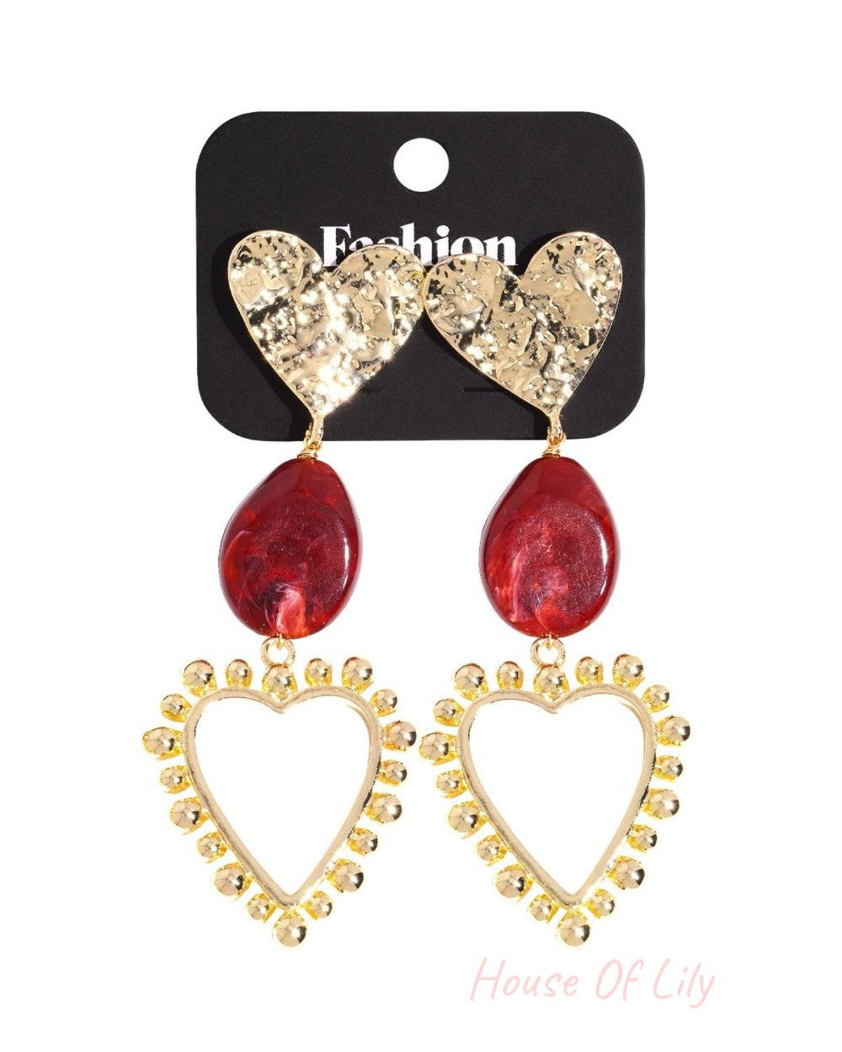 Main Character Heart Drops: Gold-tone hammered heart studs with red resin teardrop accents and open heart dangles.