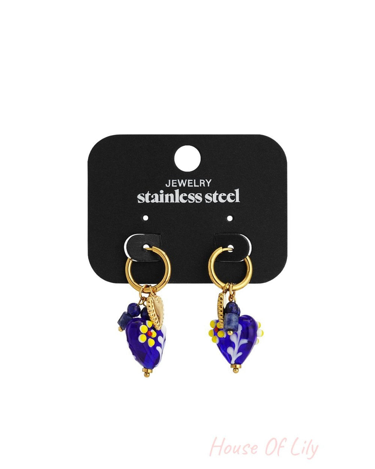 Gold stainless steel hoop earrings with dangling blue glass heart charms featuring floral patterns and small bead accents.